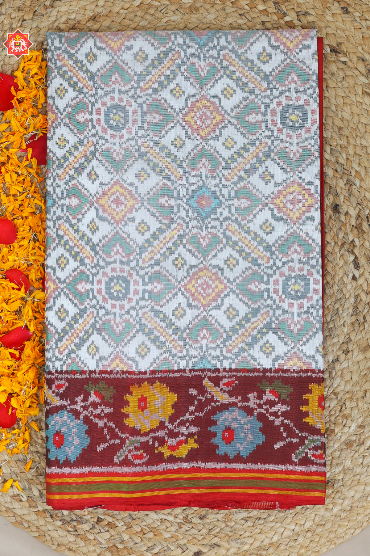 Paan chanda with flowers designer border and pallu border contras Semi double ikat patola saree