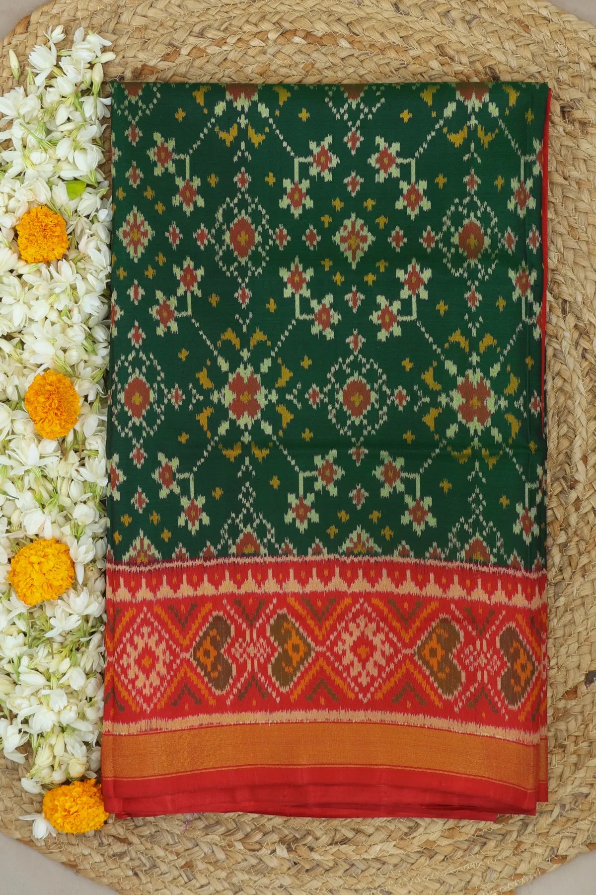 Navratna design with pallu border contras single ikat patola saree