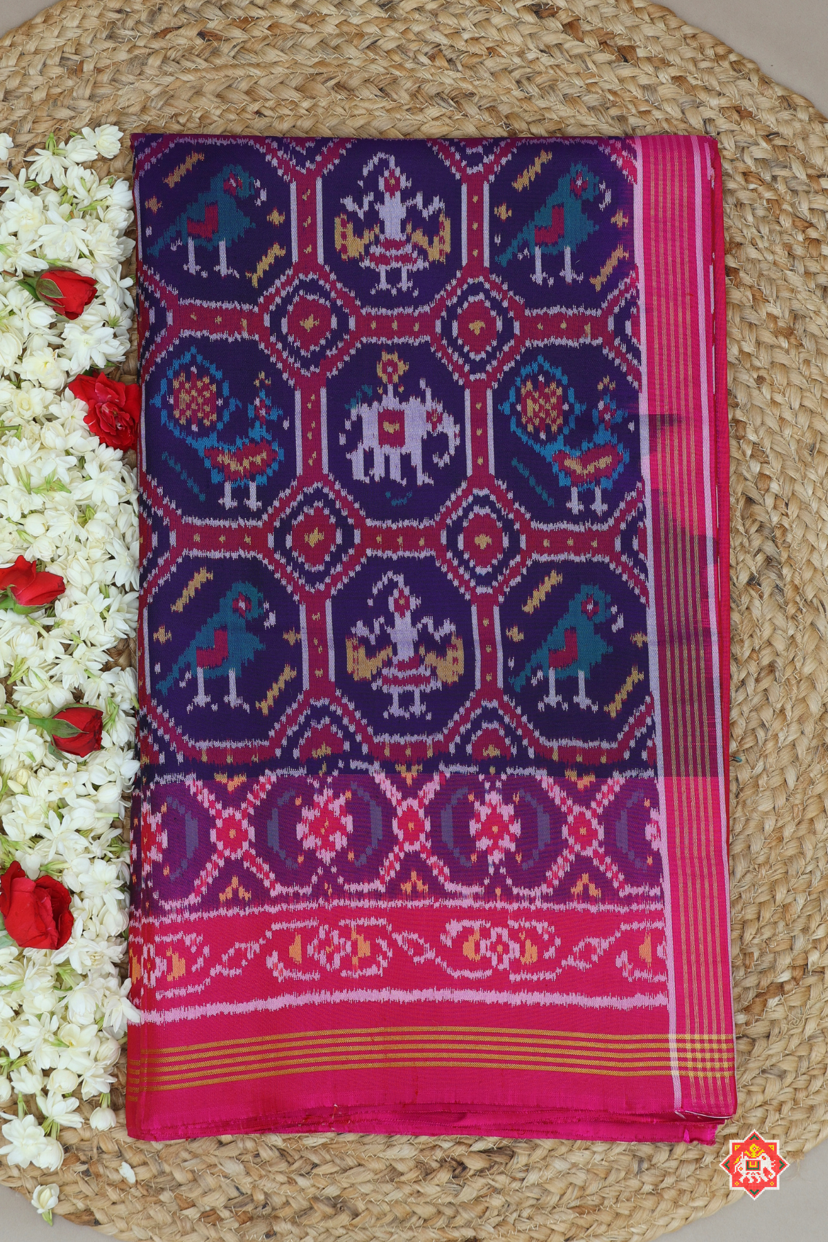 Small chabdi with motif design & ghughroo border semi double ikat patola saree