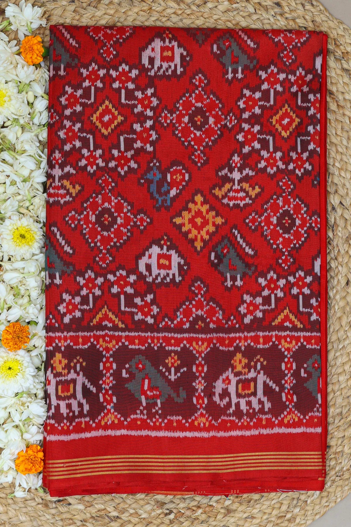 Traditional navratna with chanda design palllu border motifs design semi double ikat patola saree