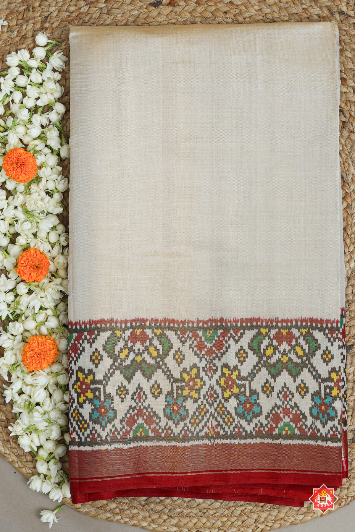 Plain off white & blouse patola design with navratna border tissue patola saree