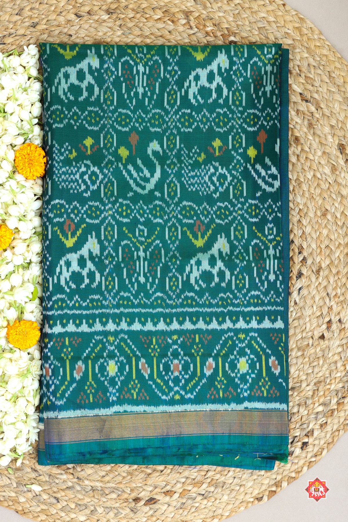 Motif design small tissue border single ikat patola saree