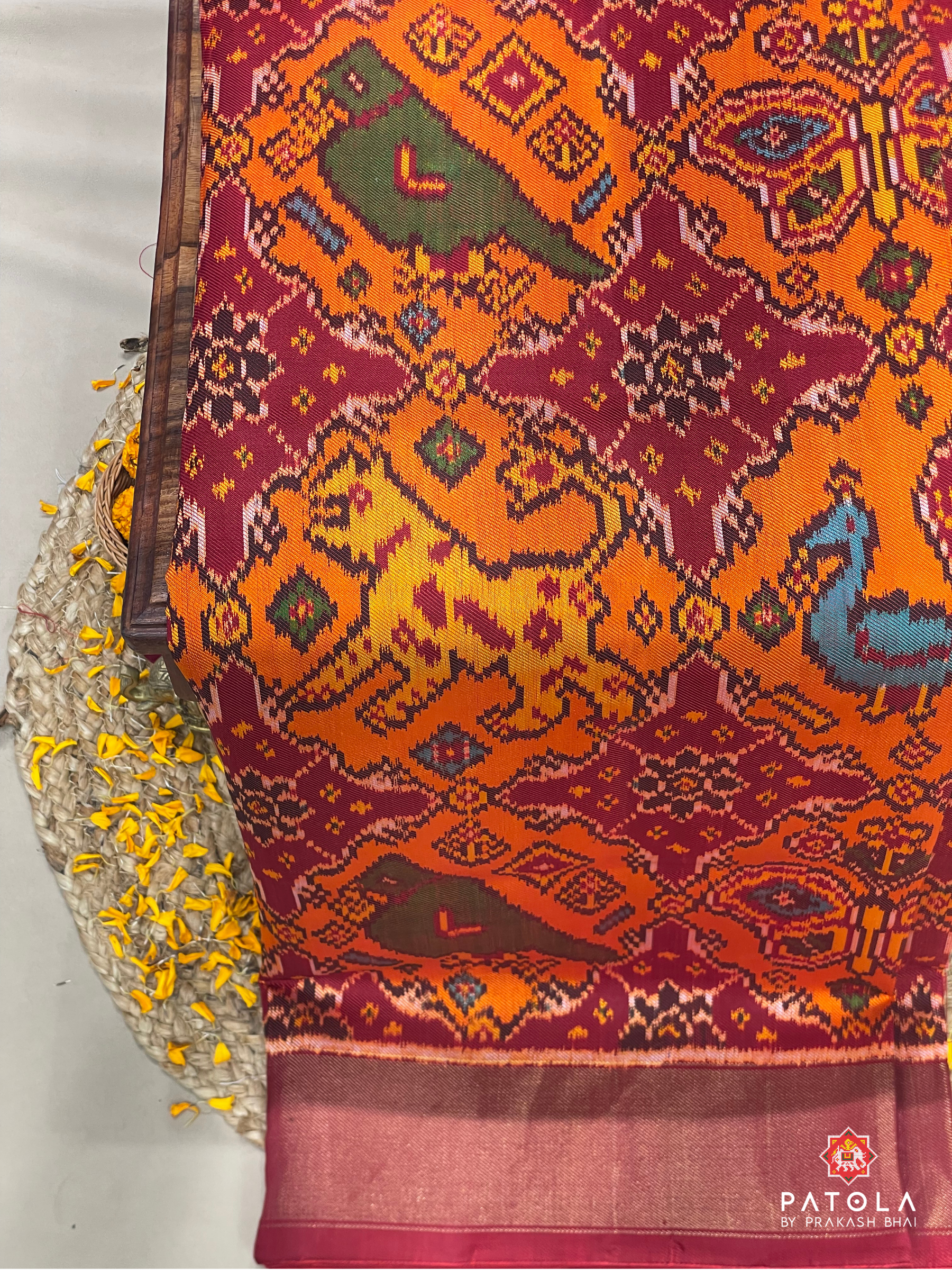 4 Figures With Chhabdi Designer Twill Patola Saree