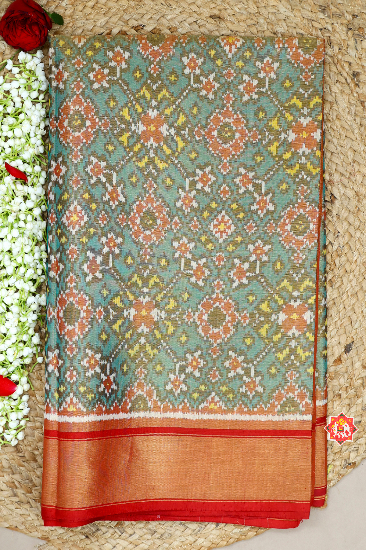 Navratna design with plain border tissue patola saree