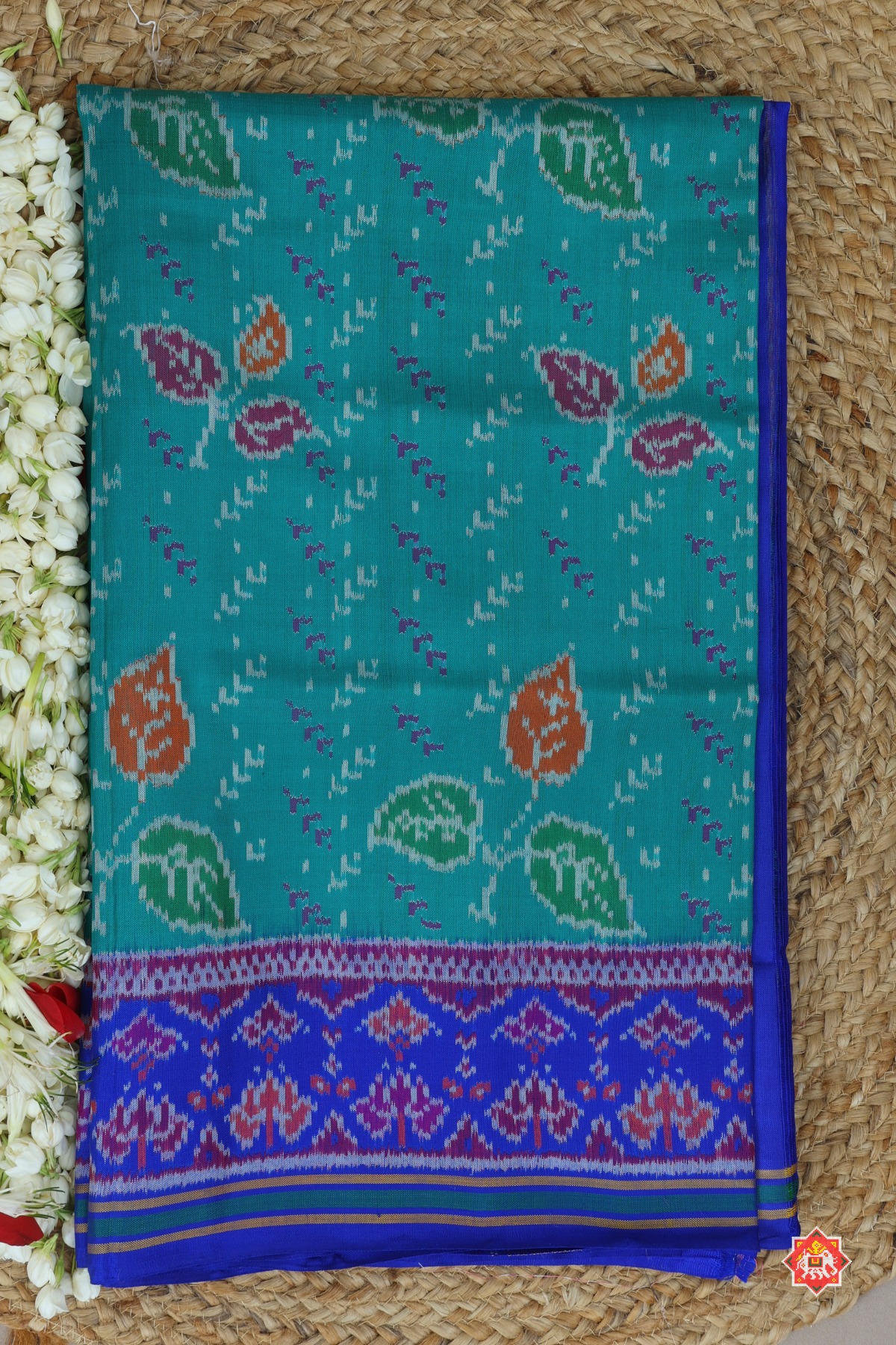 Masterpiece leaves design & pallu border flowers design semi double ikat patola saree