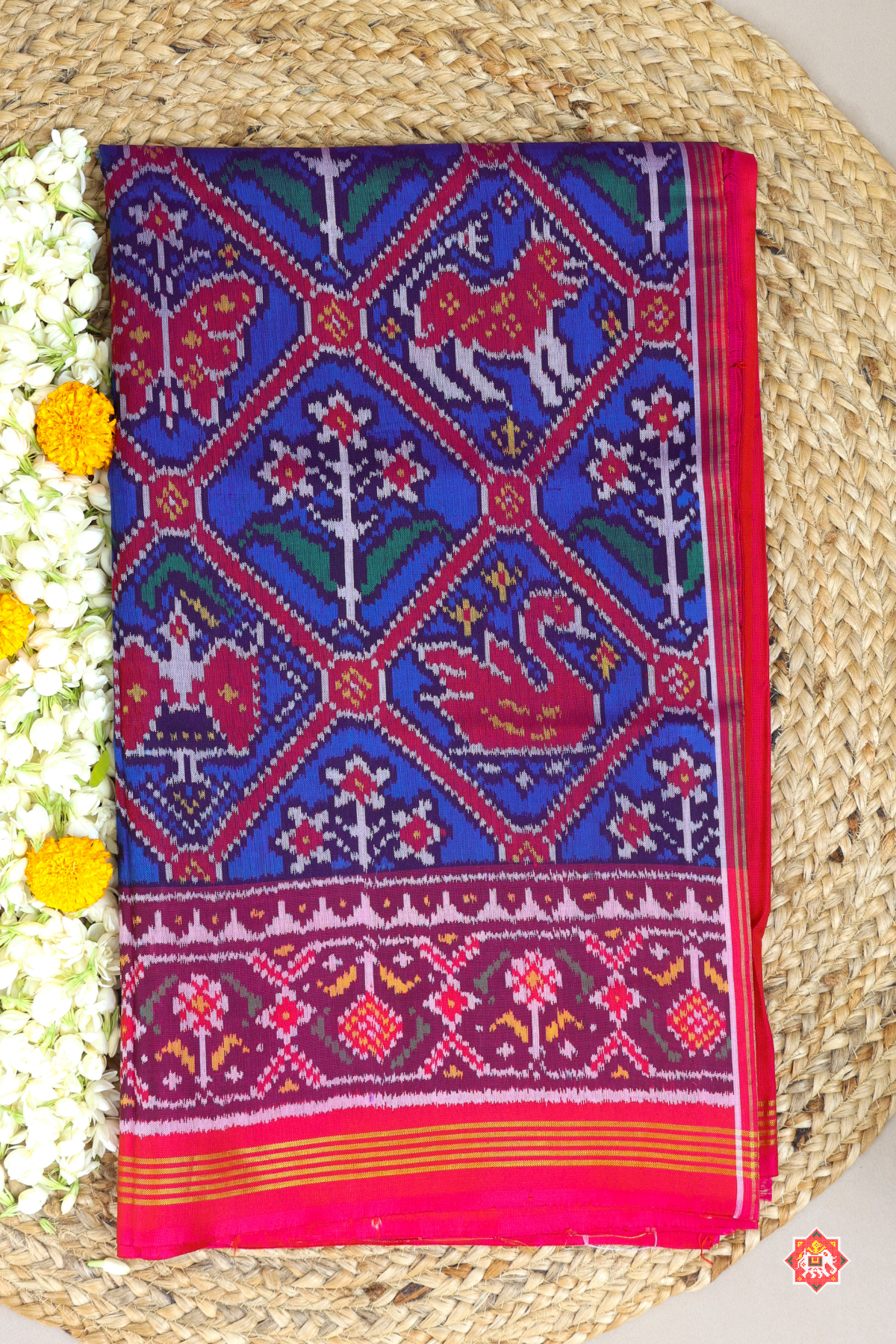 Traditional adtala design with pallu border contras semi double ikat patola saree