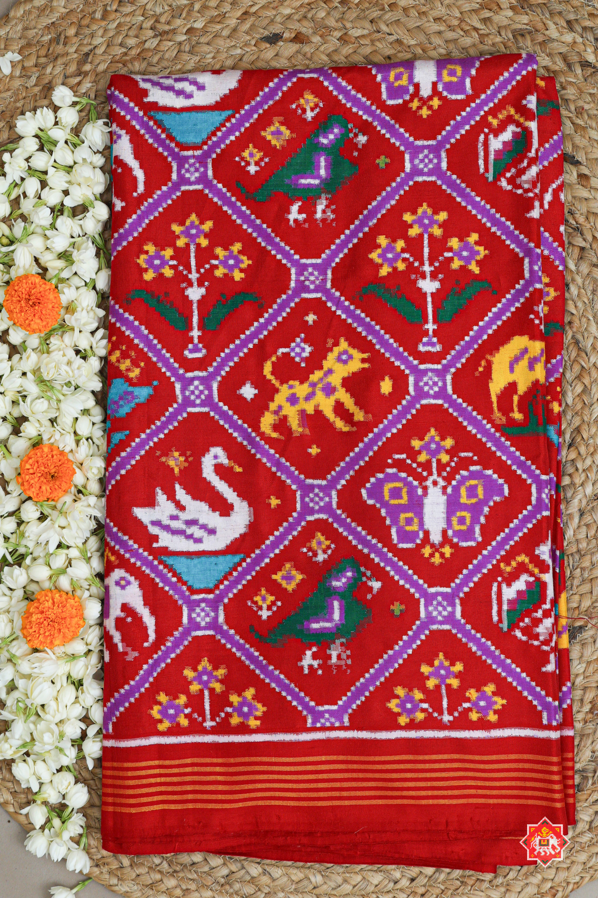 Adtala design with traditional flower design pallu pure double ikat patola saree
