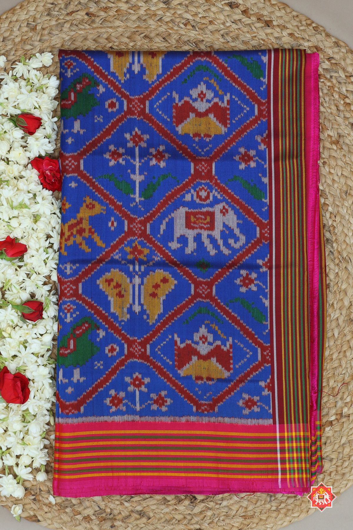 Tarditional adtala design with lines border semi double ikat patola saree