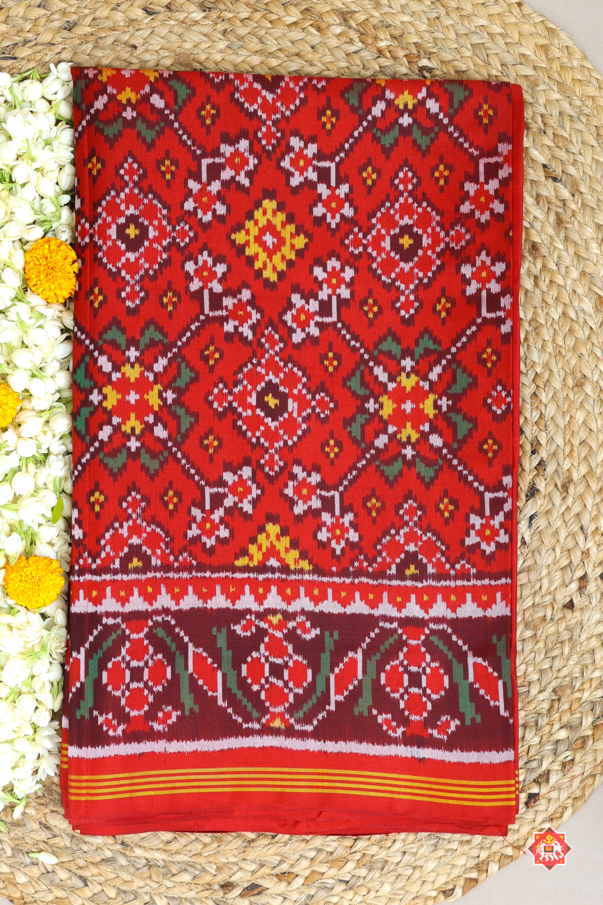 Traditional navratn design with minakari work pallu border self semi double ikat patola saree