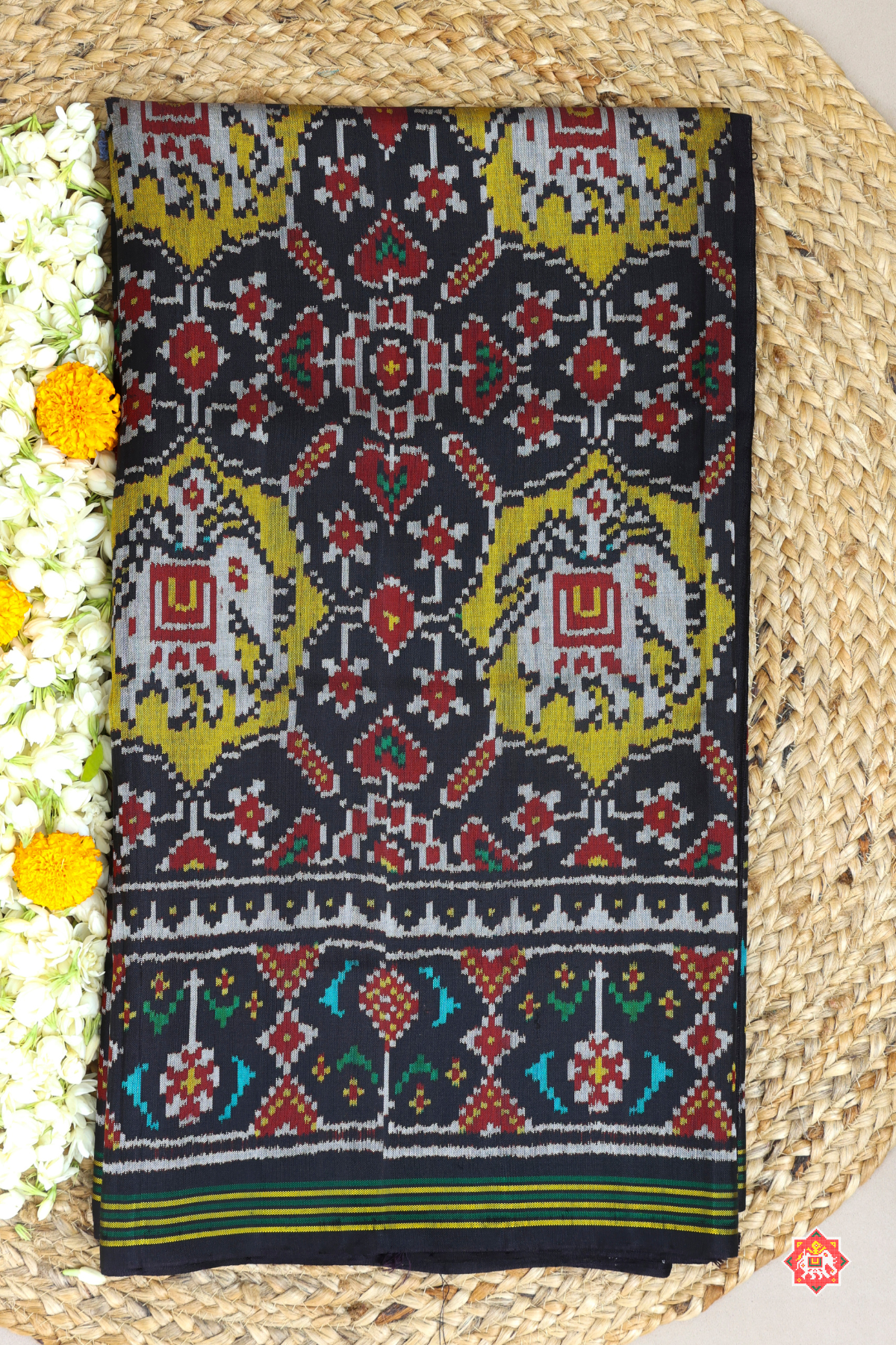 Maneck chowk design with elephant pallu border ghughroo design semi double ikat patola saree