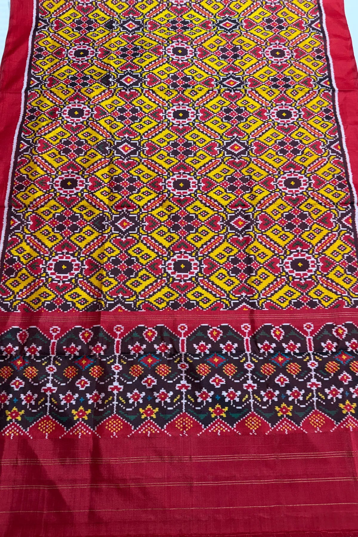Manek chowk design with minakari work semi double ikat patola dupatta