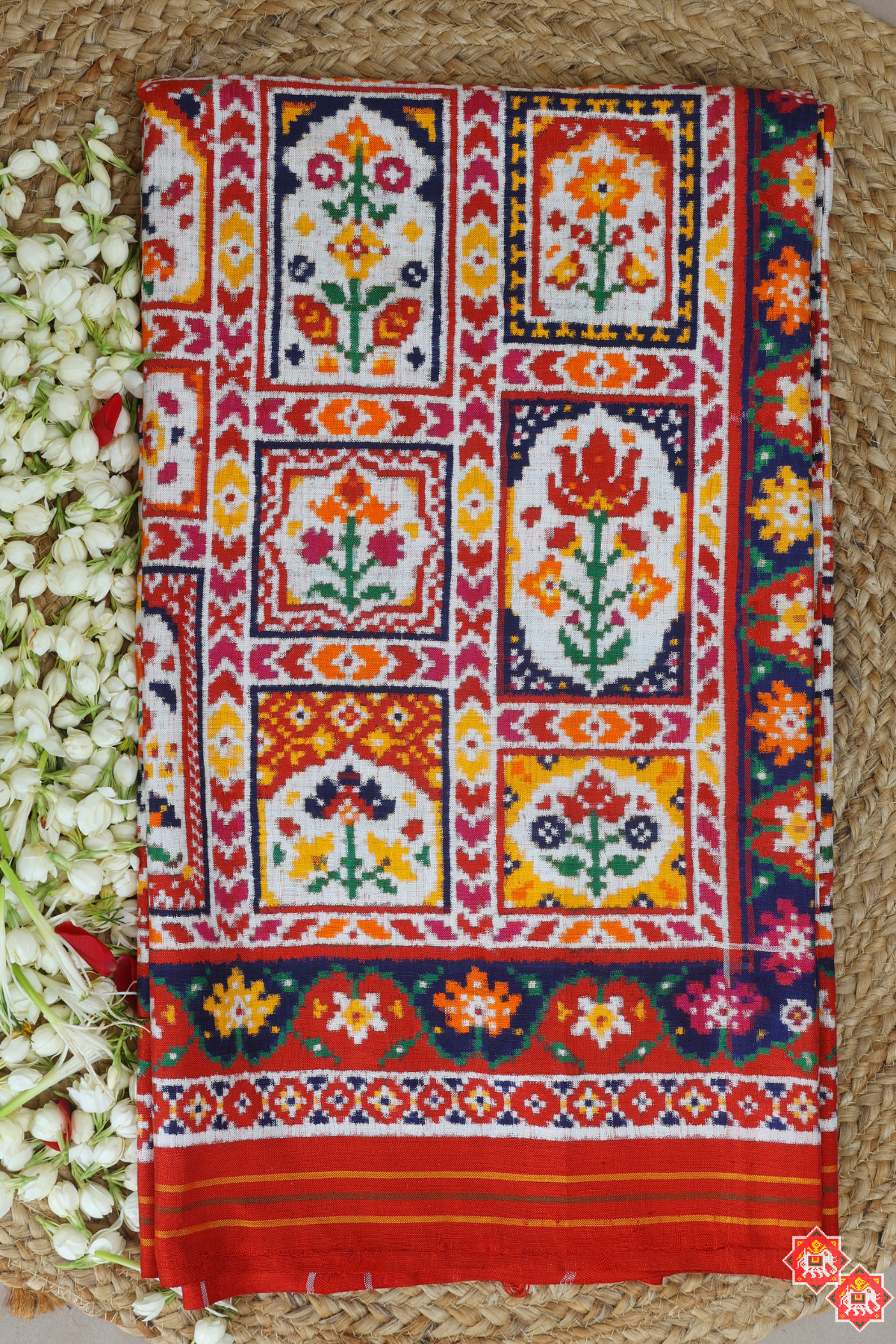 Signature piece patan patola silk double ikat jharokha design off white saree