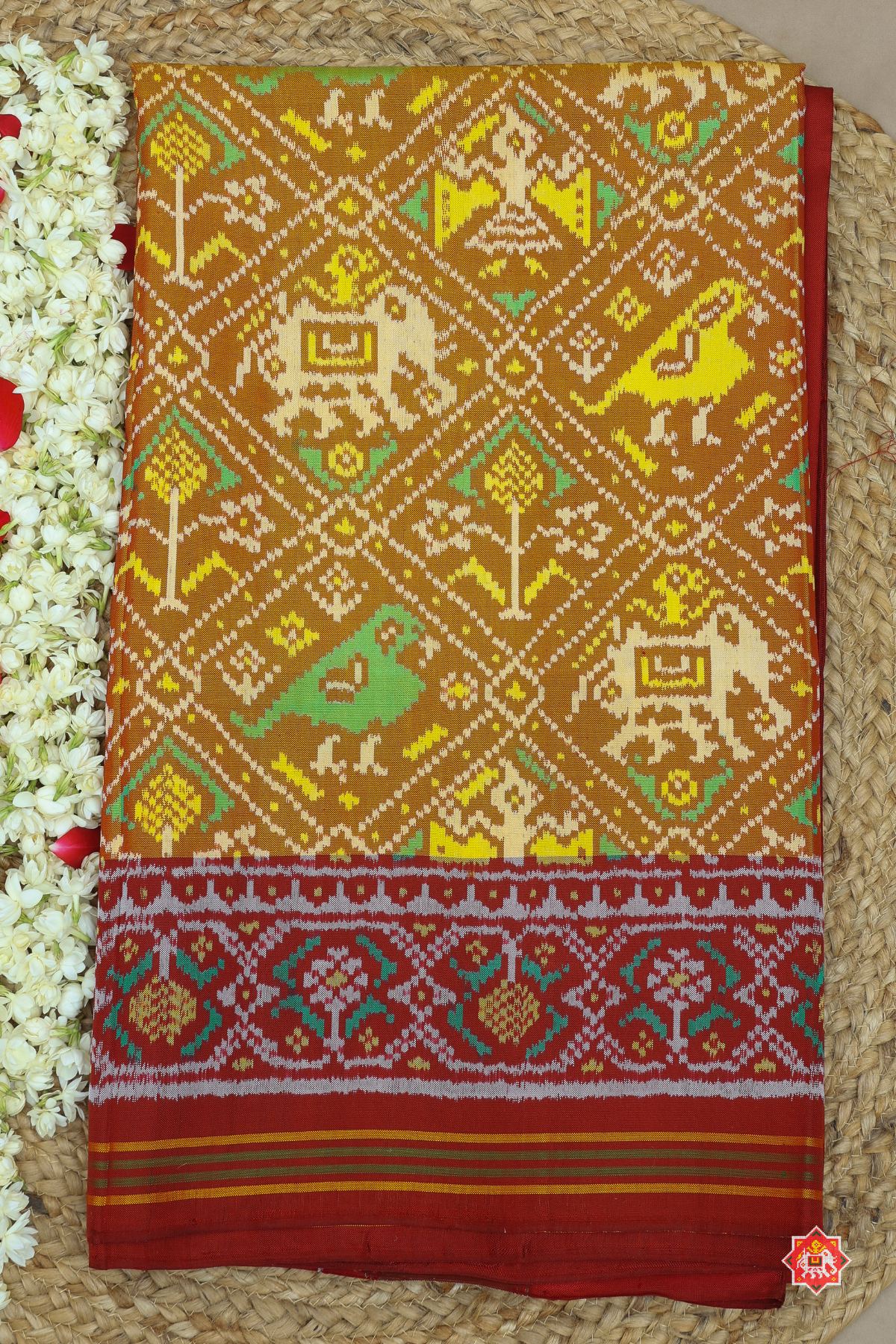 Traditional adtala design pallu border semi double ikat patola saree