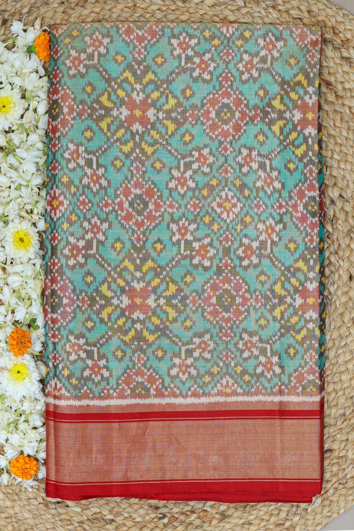 Navratna design with minakari work  tissue patola saree