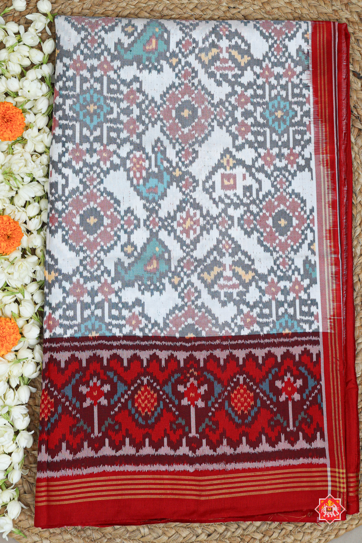 Navratna design with elephant design semi double ikat patola saree