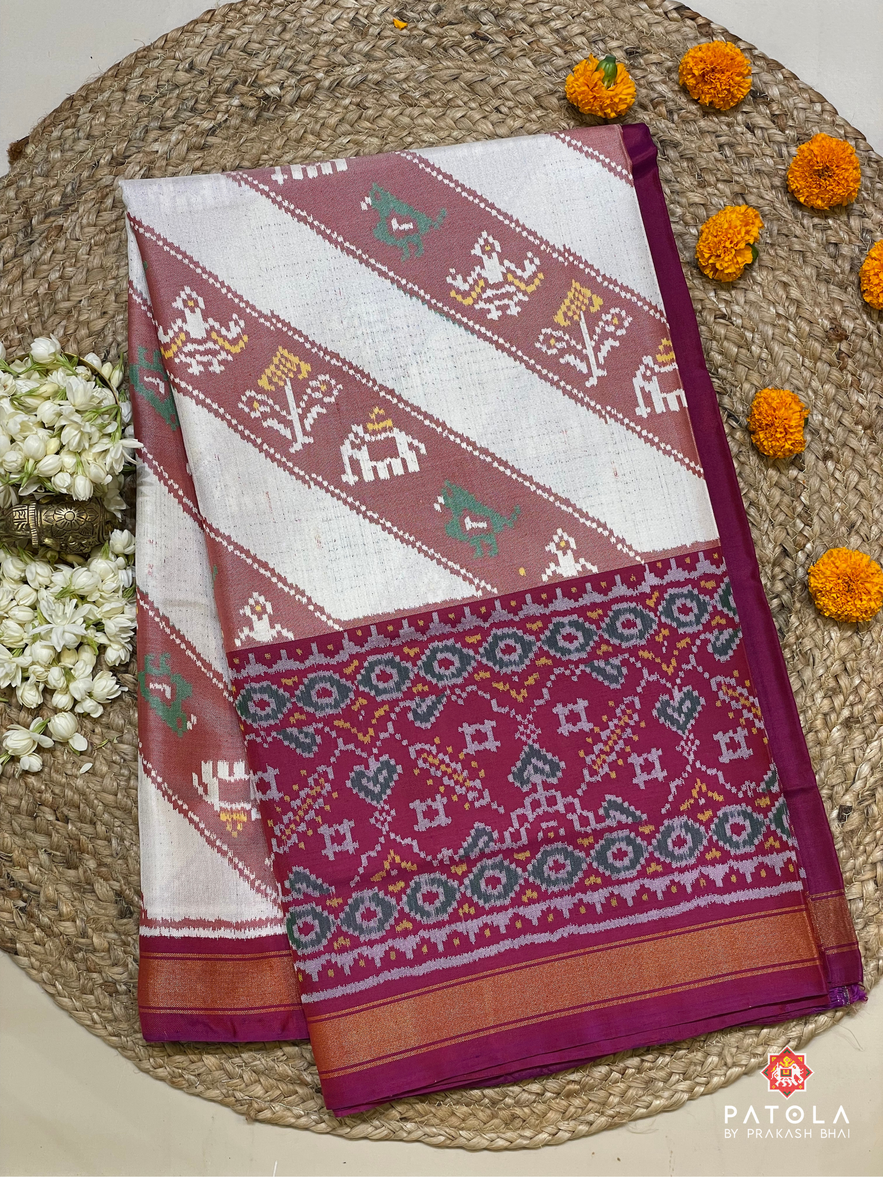 Manekchowk Scut Boder Semi Double Ikat Patola Saree