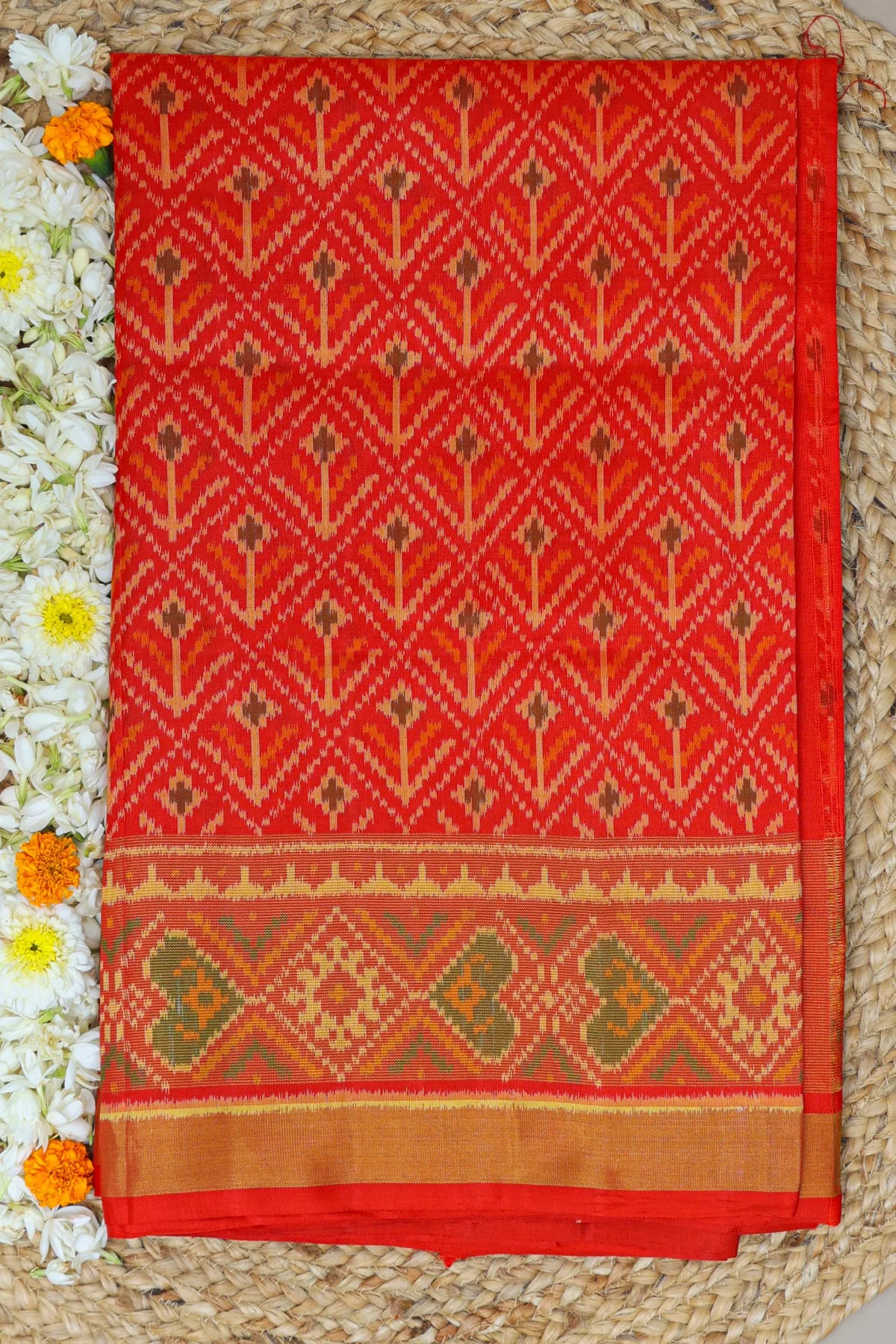 Plain color fancy flower design with tissue border single ikat patola saree