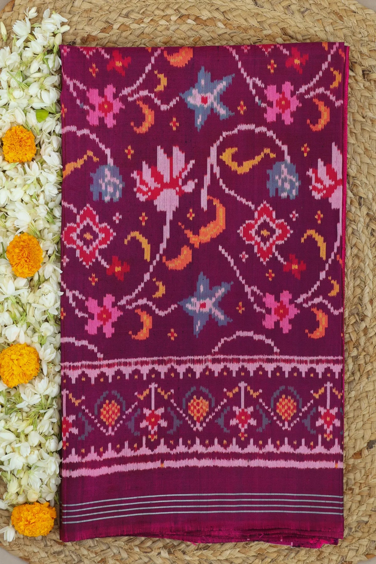 Rangoli design with lines border traditional deisgn pallu semi double ikat patola saree