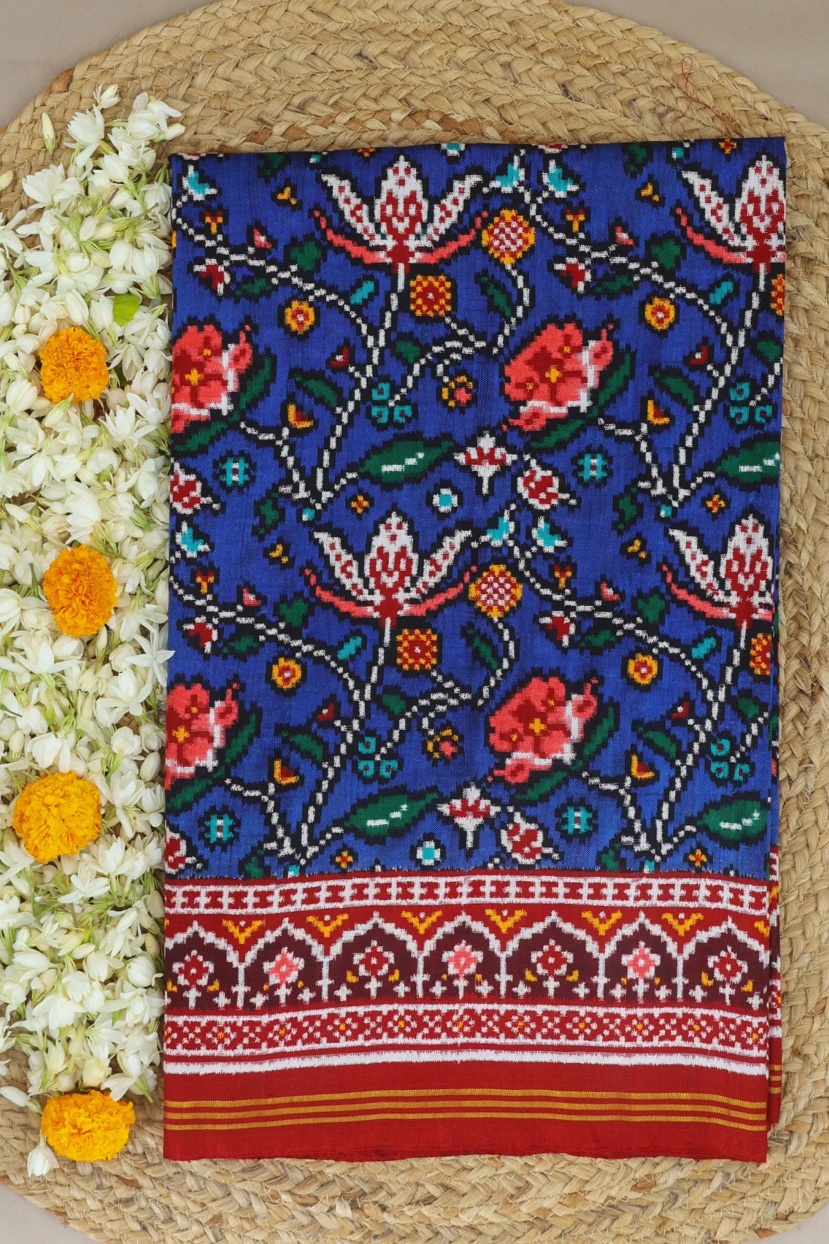 Patan patola traditional master piece rangoli design with border pallu motif design double ikat saree