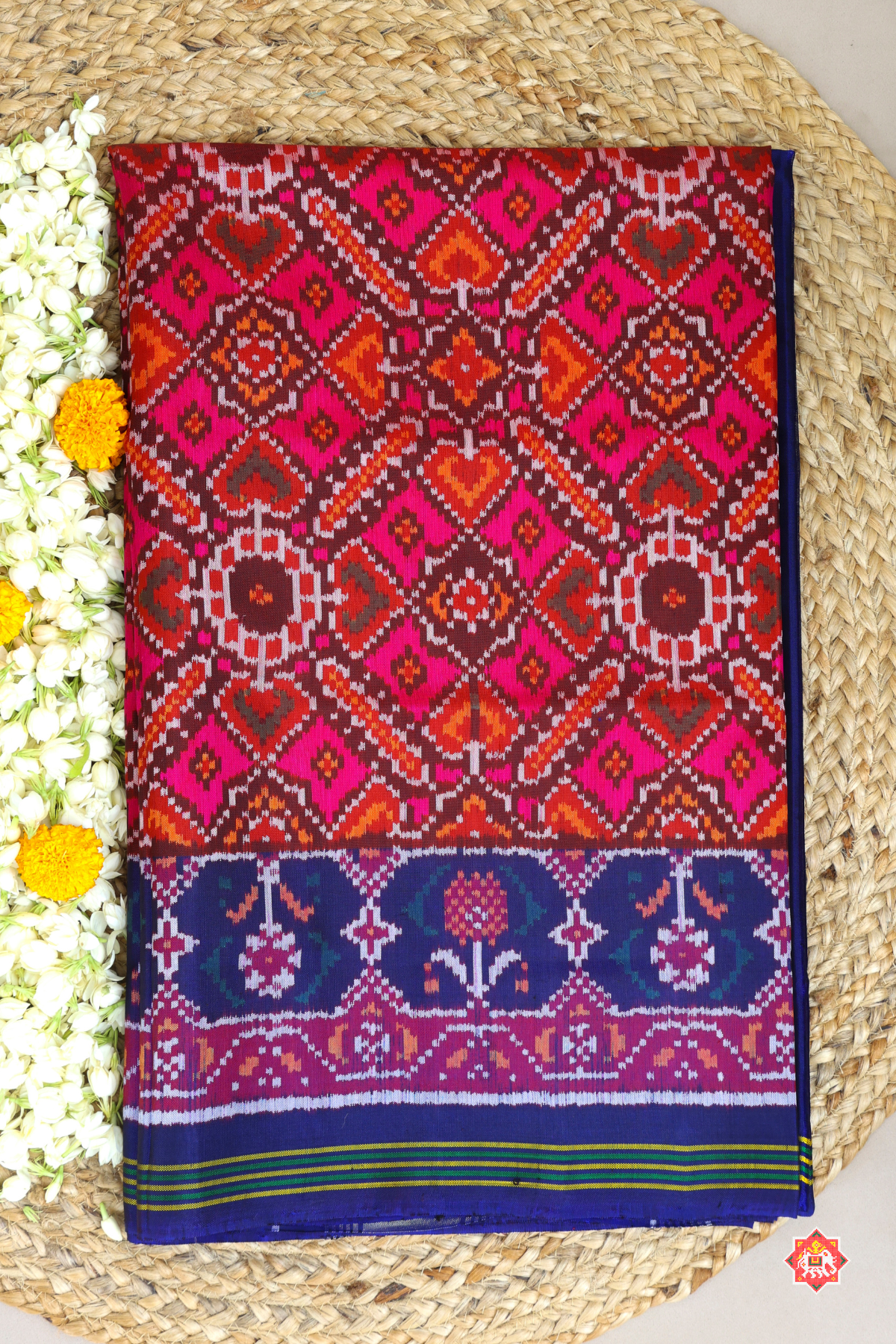 Traditional manek chowk design with ghughroo border Semi double ikat patola saree