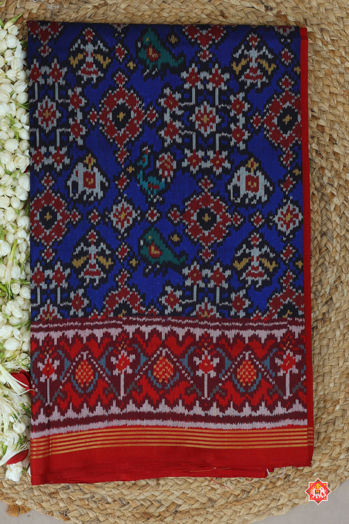 Traditional navratn design with small motif design semi double ikat patola saree