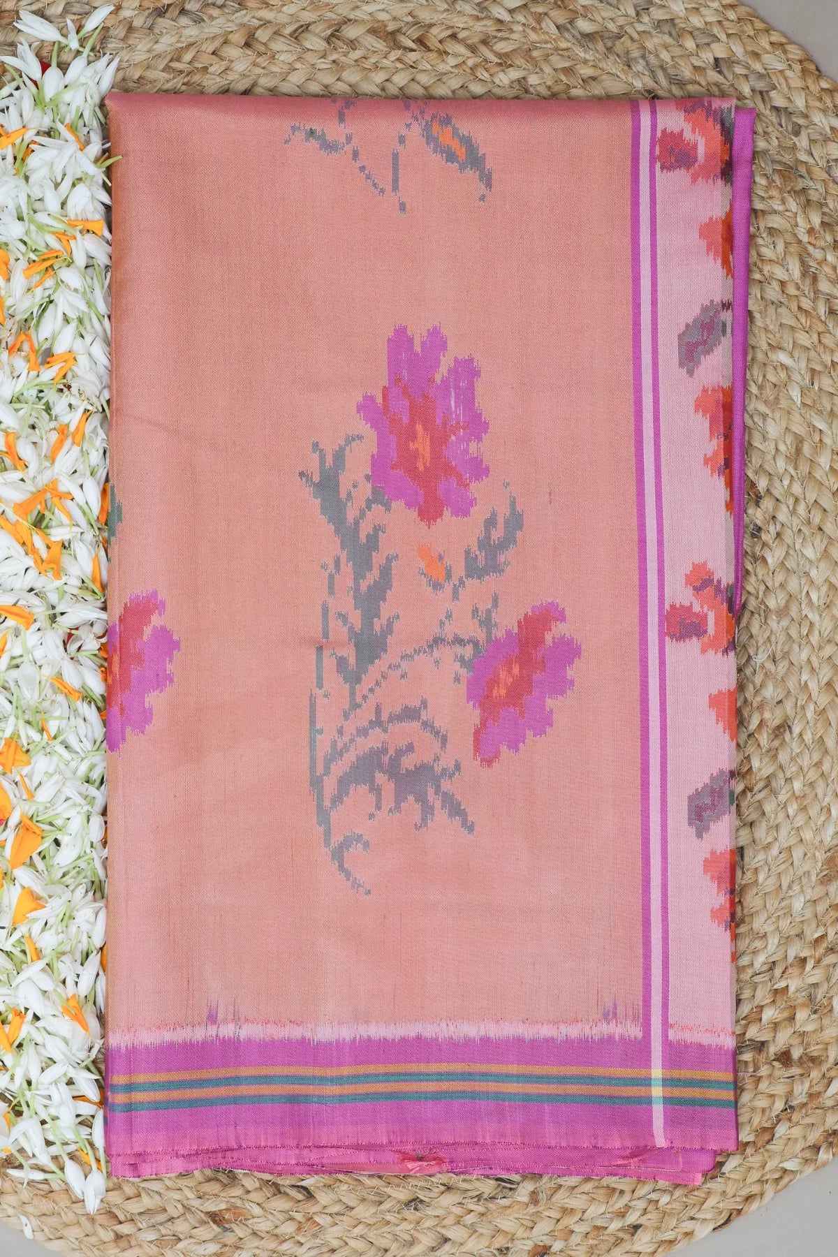 Masterpiece fancy flowers design semi double ikat patola saree