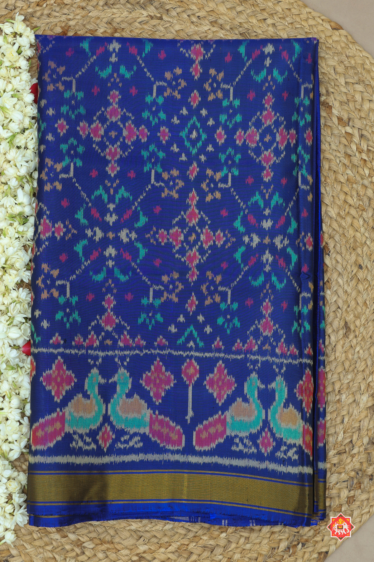 Navratna design with peacock small tissue border single ikat patola saree