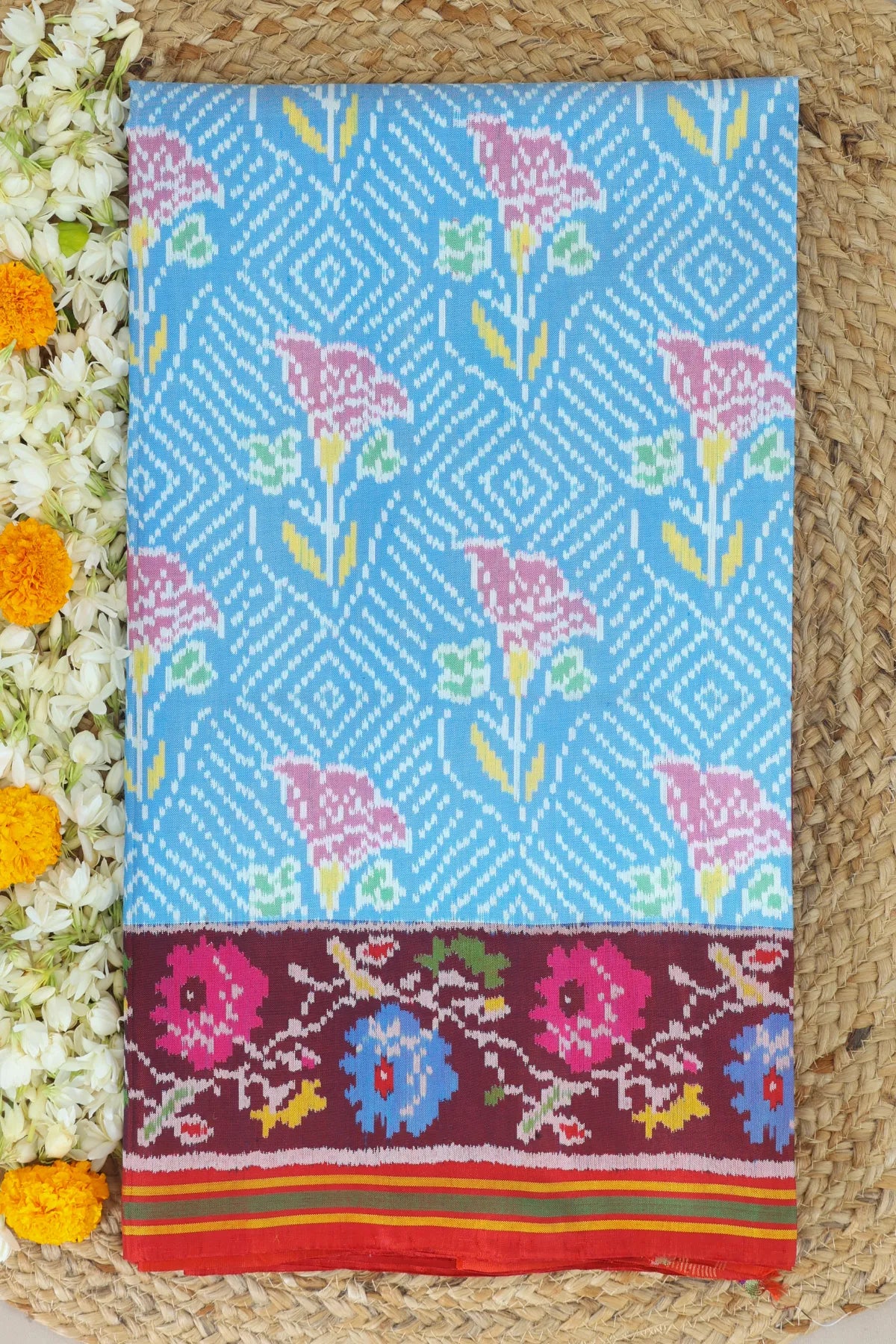 Master piece rose designer with contras flowers design with pallu border semi double ikat patola saree