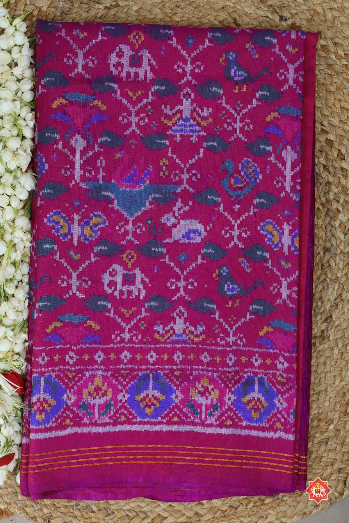 Small motifs design & traditional pallu semi double ikat patola saree