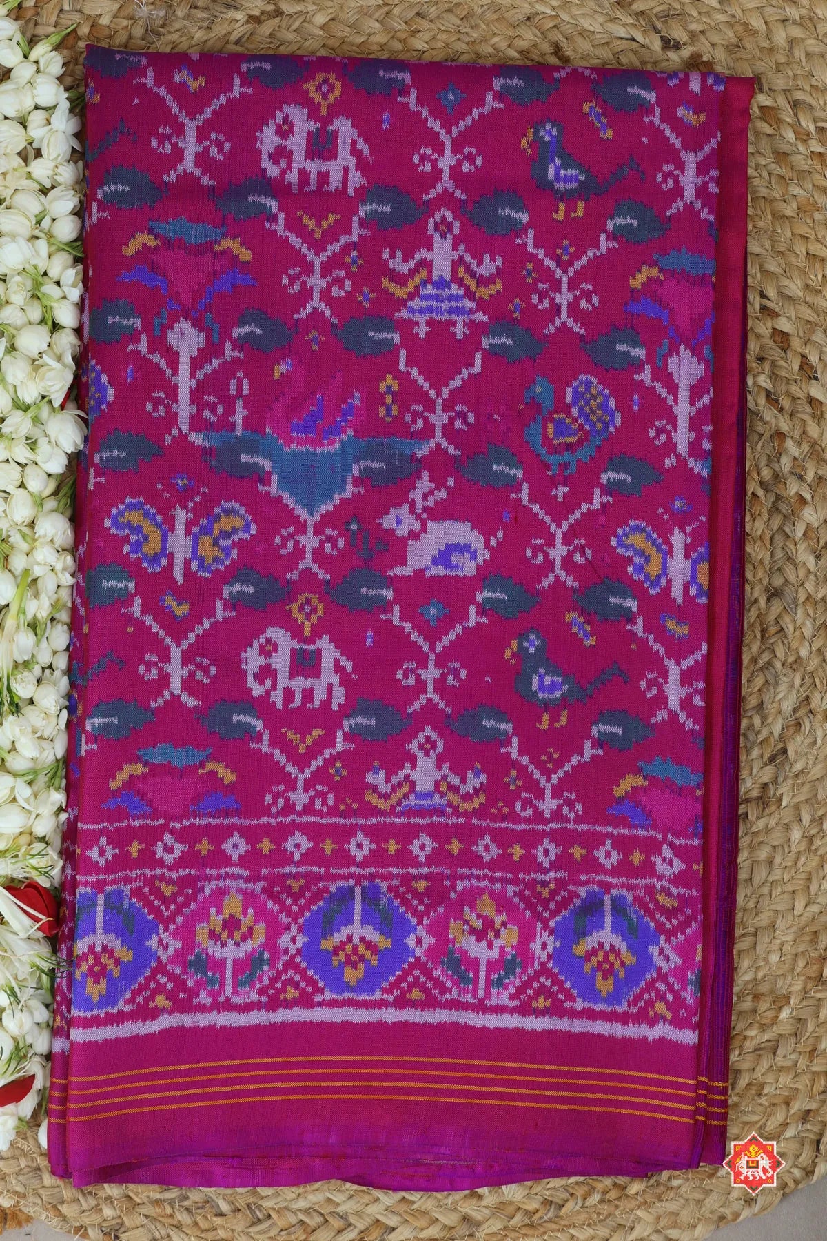 Small motifs design & traditional pallu semi double ikat patola saree