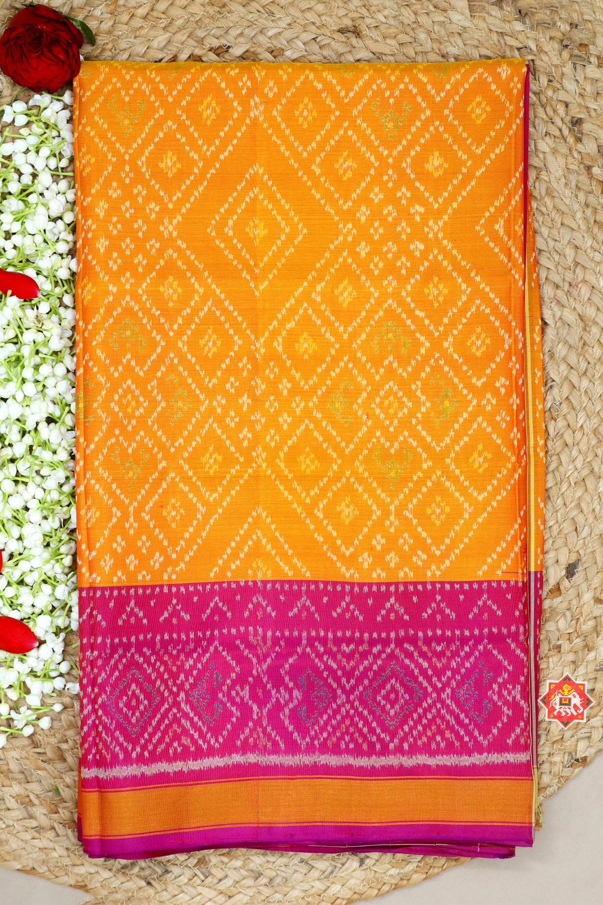 Bandhani design with small tissue border design single ikat patola saree