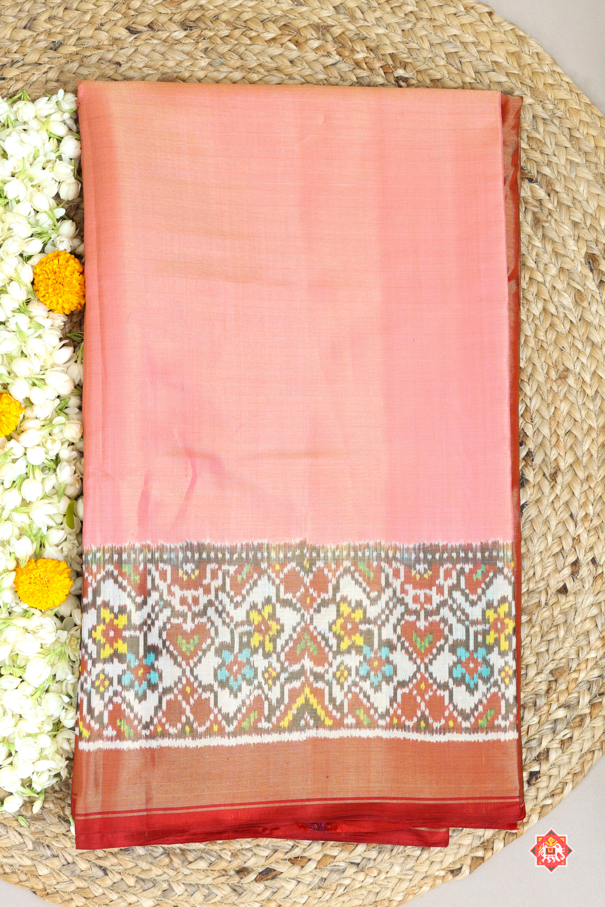 Plain pink with off white navratna manek chowk border tissue patola saree