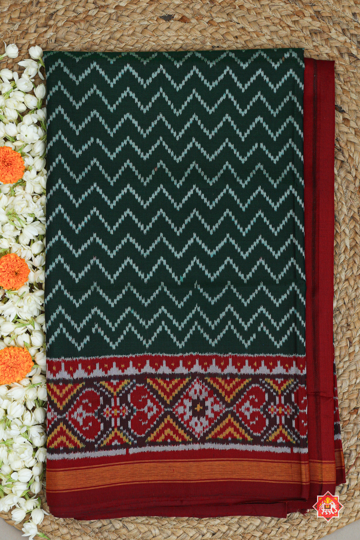 Zigzag design with border traditional design semi double ikat patola saree
