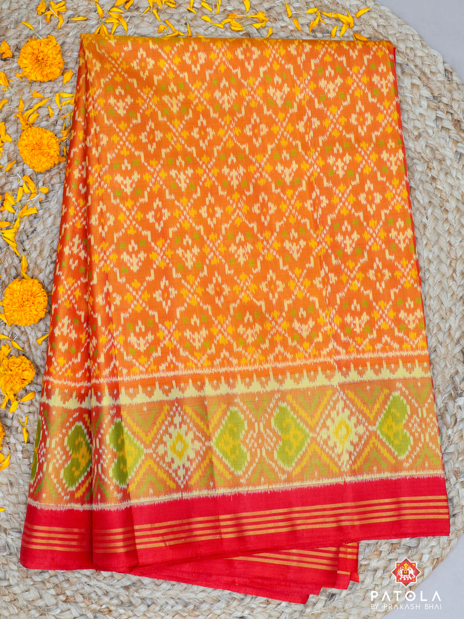 Traditional Orange Button Phool Designer Single Ikat Patola Saree