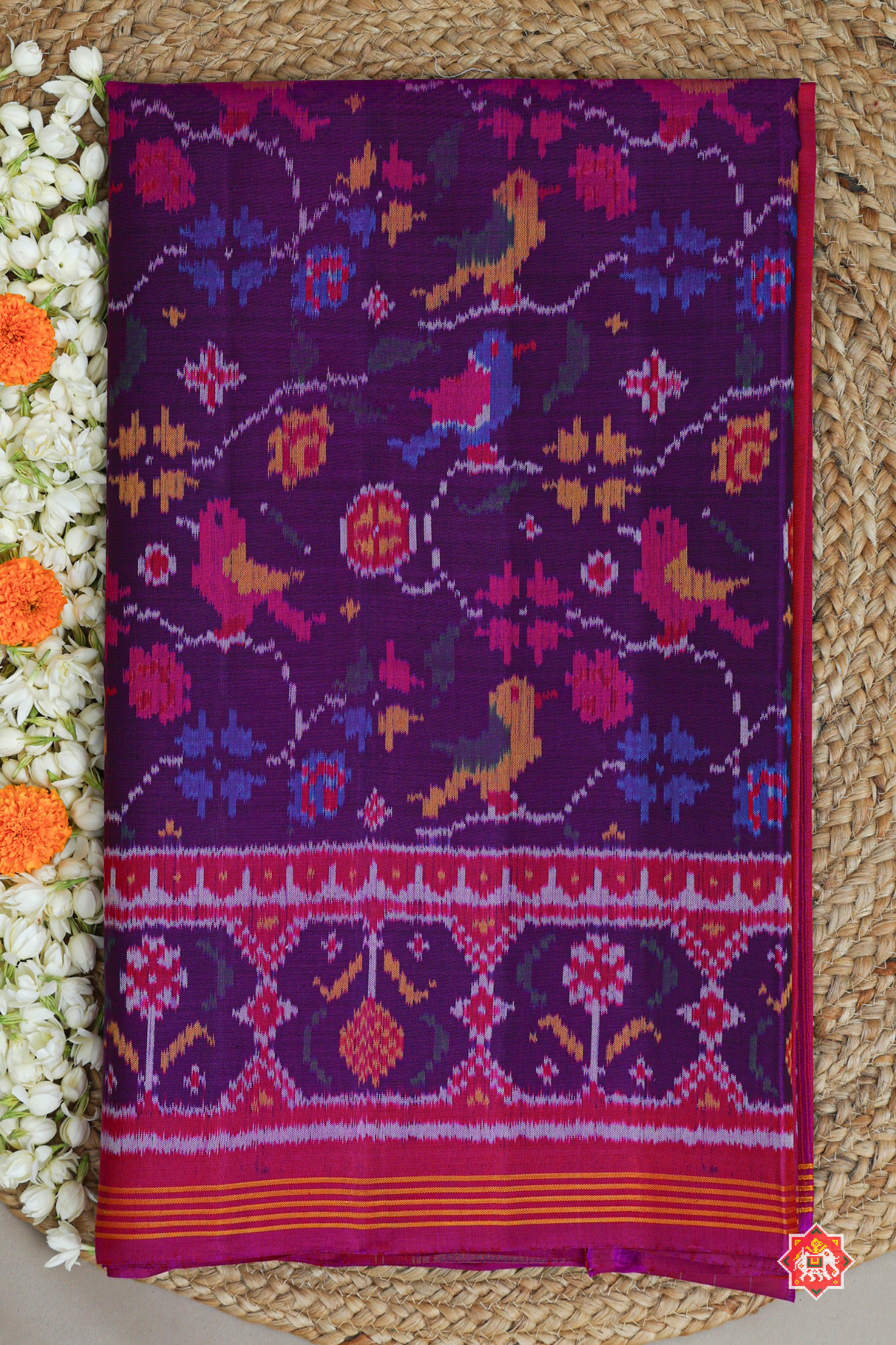 Vell design with motif design ghughroo border semi double ikat patola saree