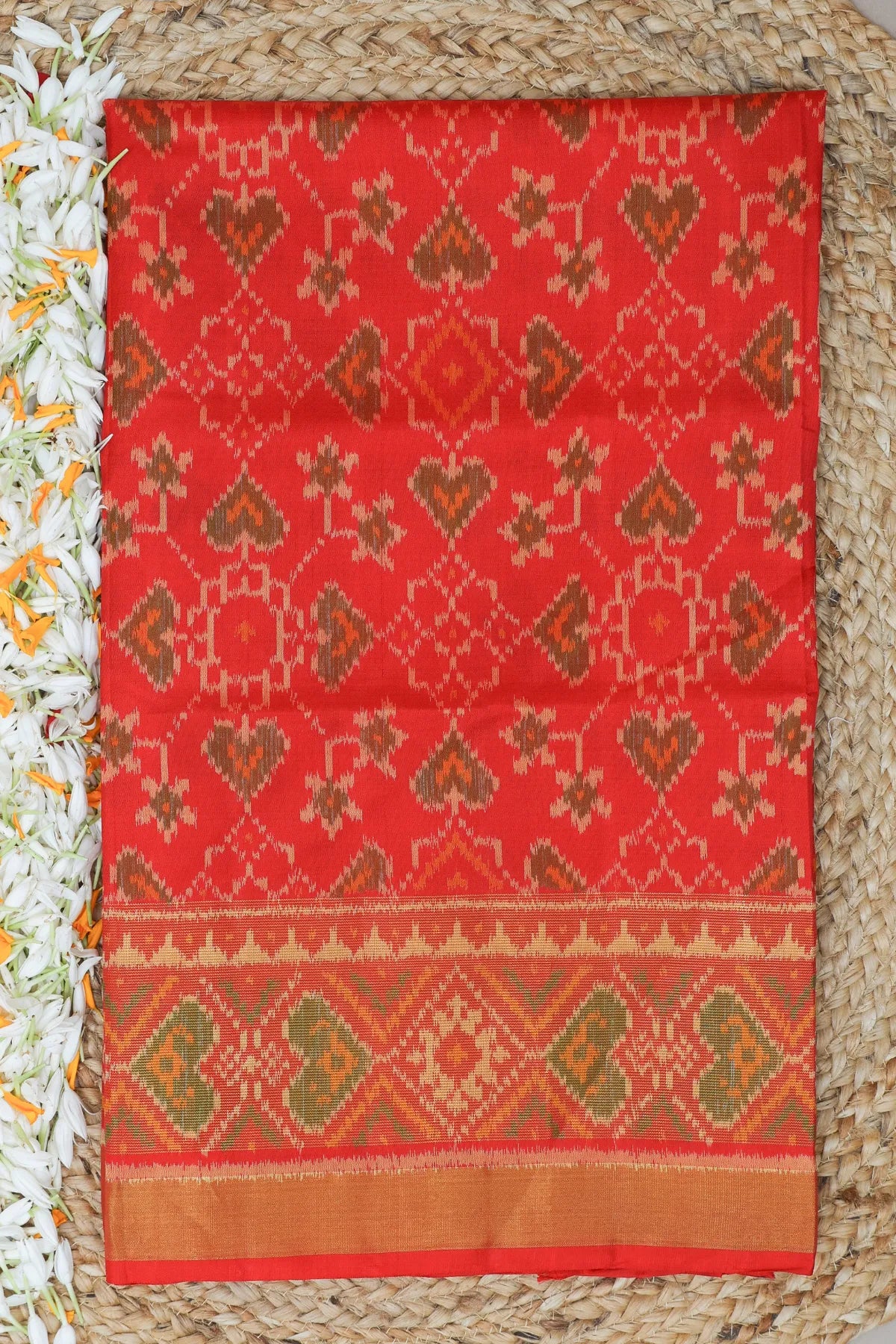 Paan chanda design with tissue border single ikat patola saree