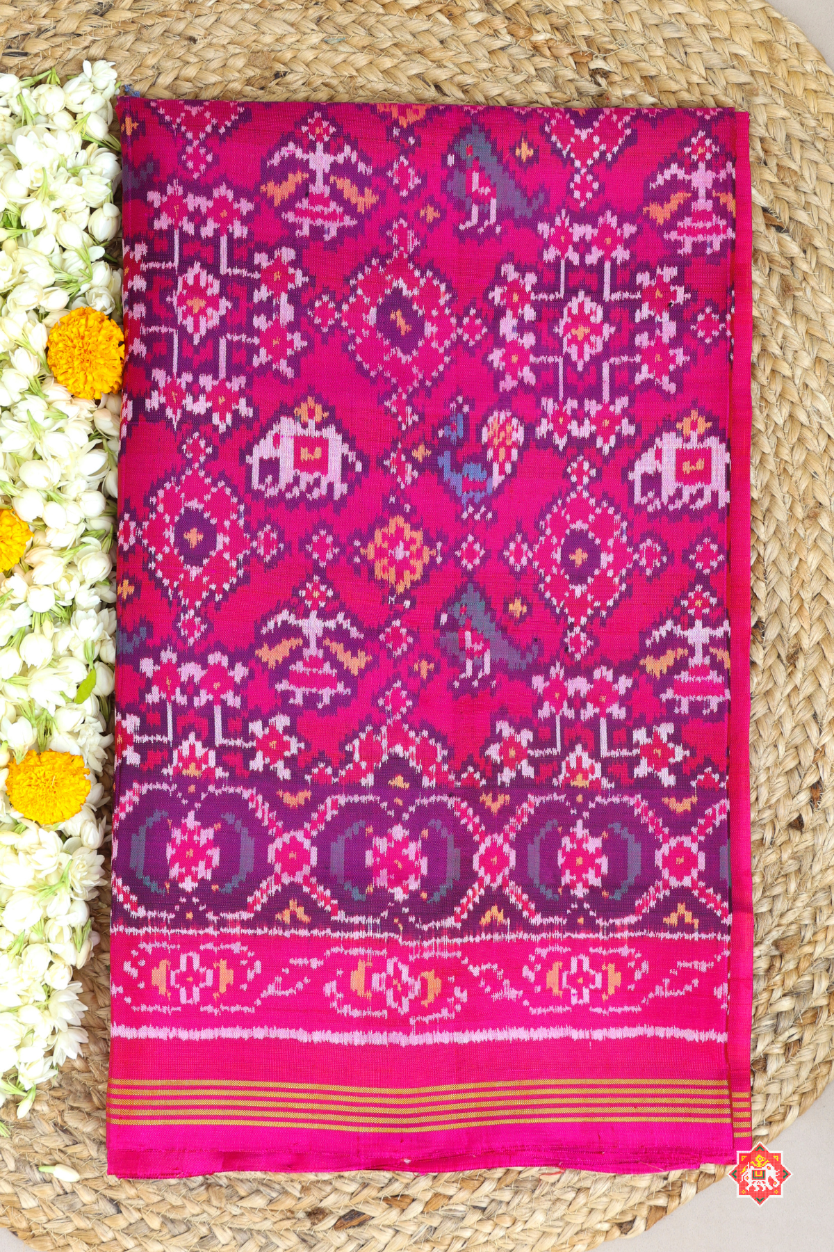 Traditional navratn design with small motif design semi double ikat patola saree