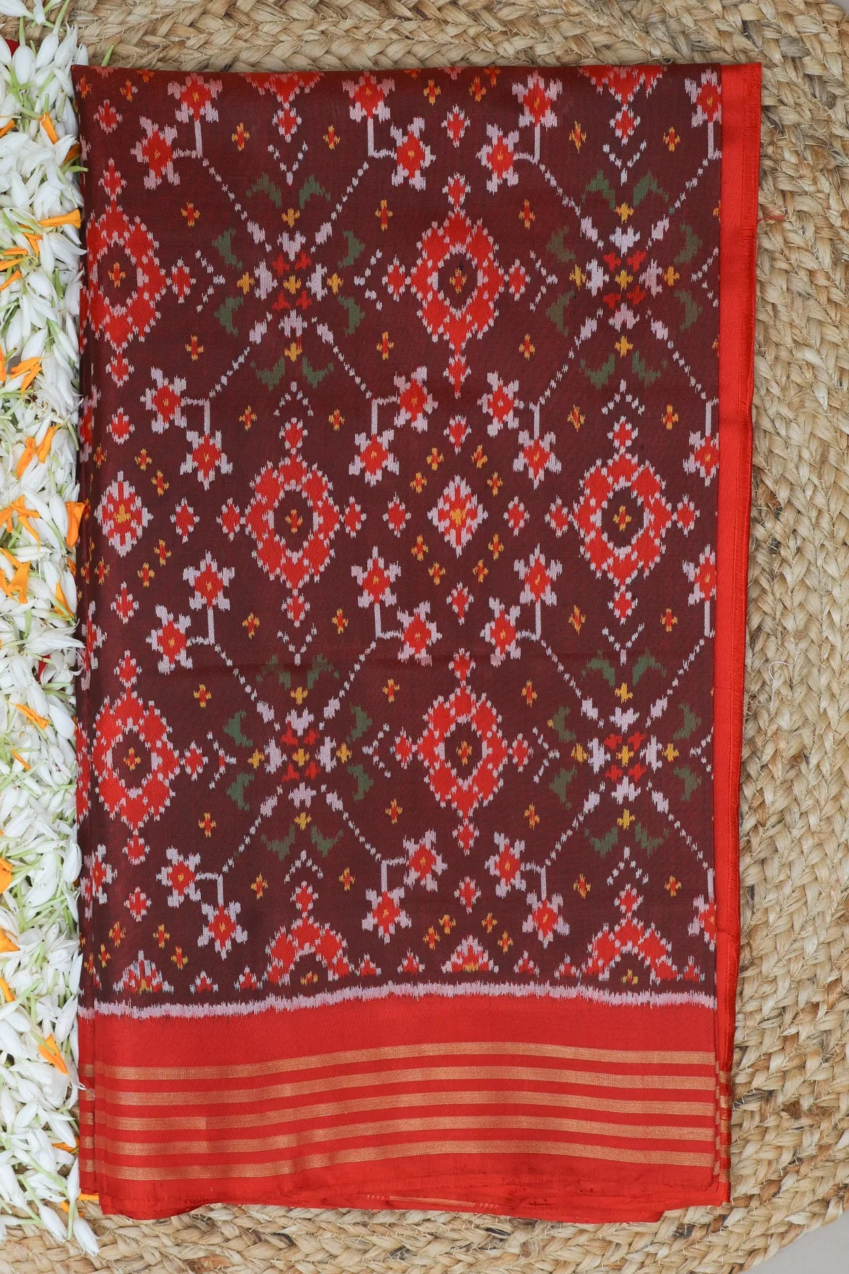 Traditional navratna design with minakari work  single ikat patola saree