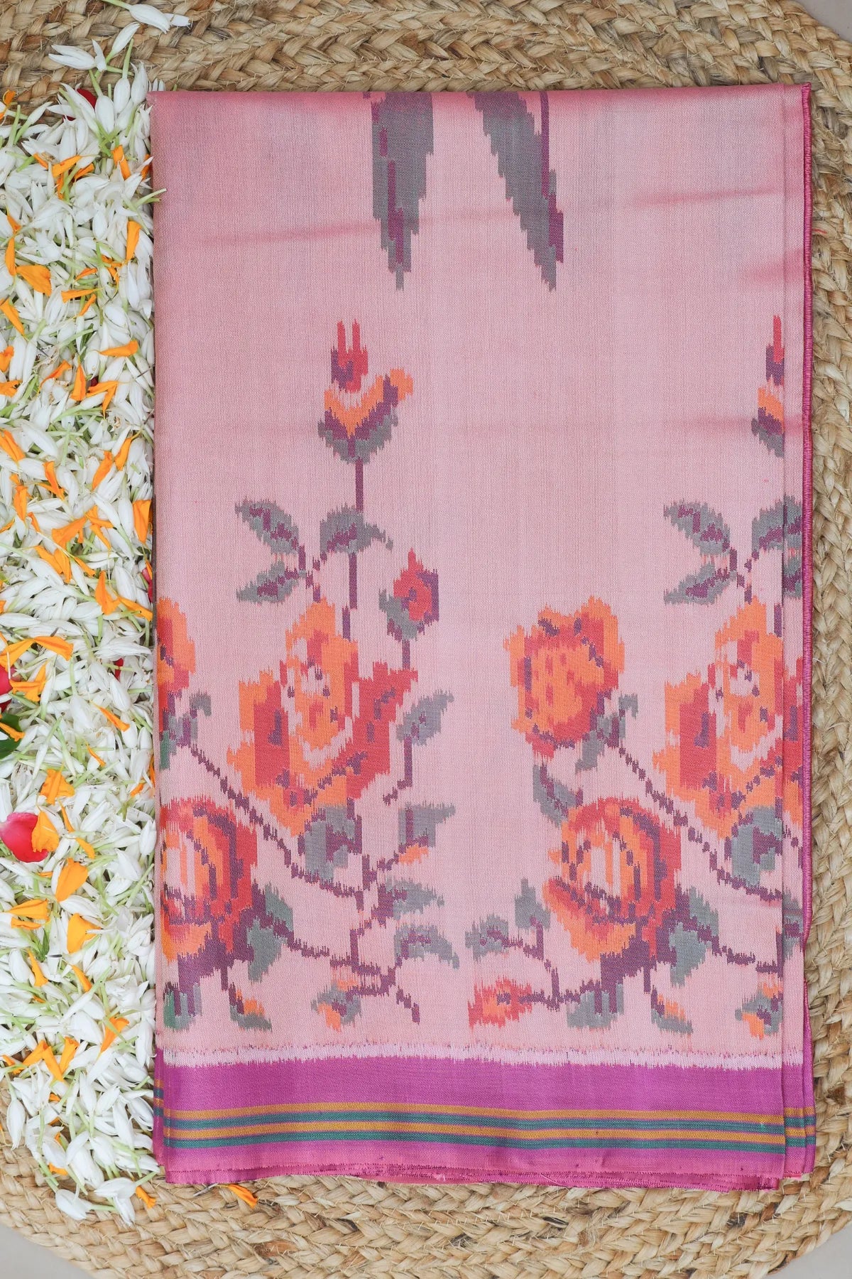 Masterpiece suct border with flower design pallu semi double ikat patola saree