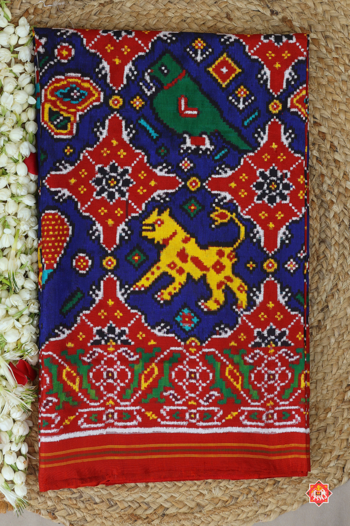 Patan patola  classic royal blue wildlife grid design with heritage motifs pure double ikat patola saree