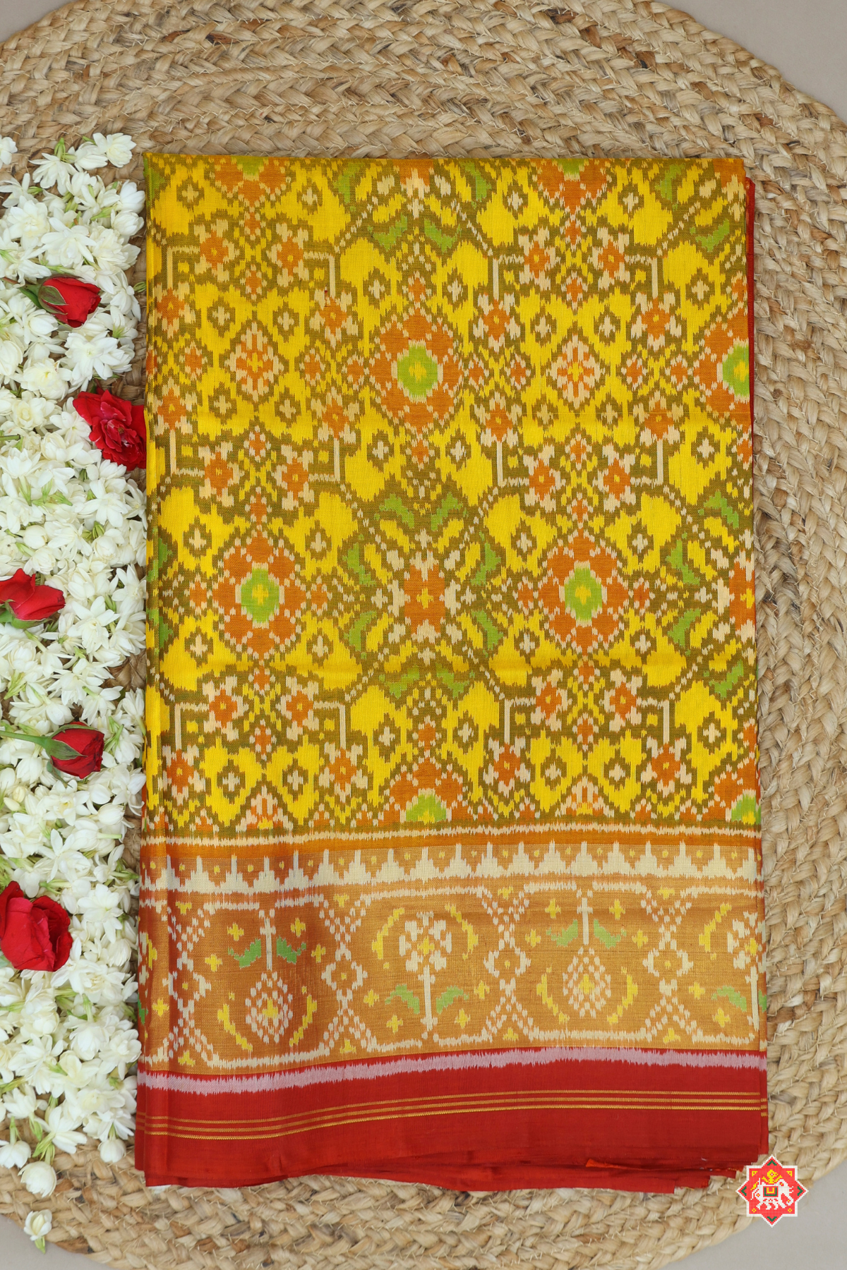 Traditional navratna design with minakari work tissue border single ikat patola