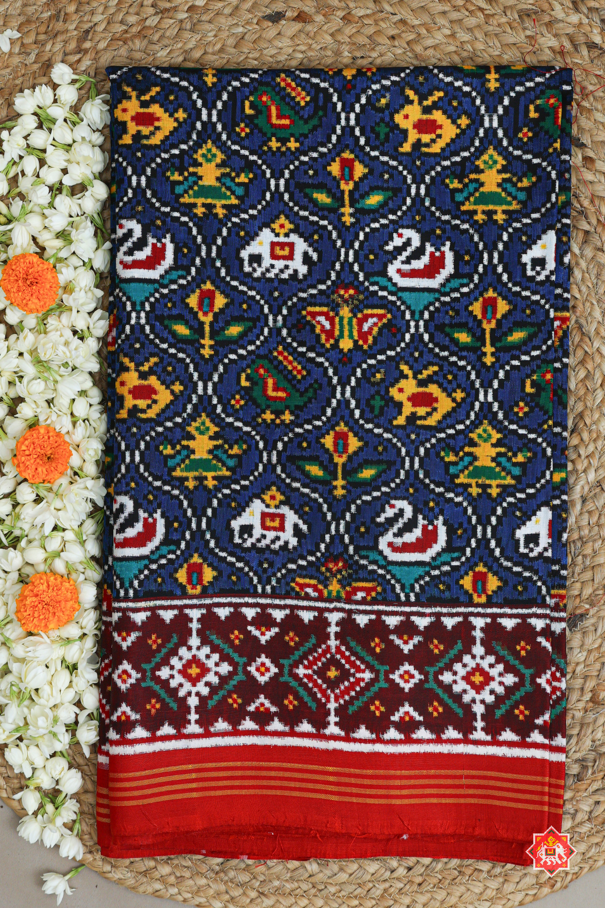 Small chabdi design with motif design pure double ikat patola saree
