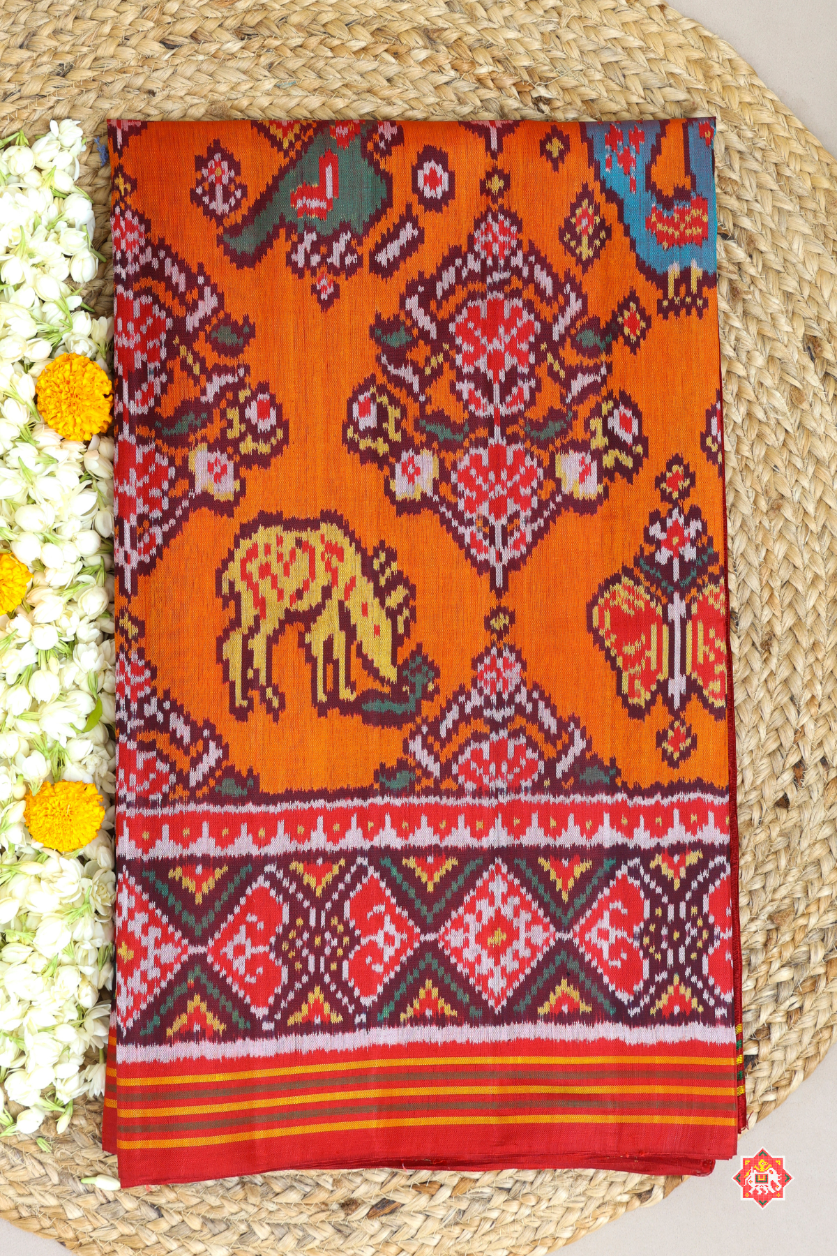 Master piece flower & motif design semi double ikat patola saree