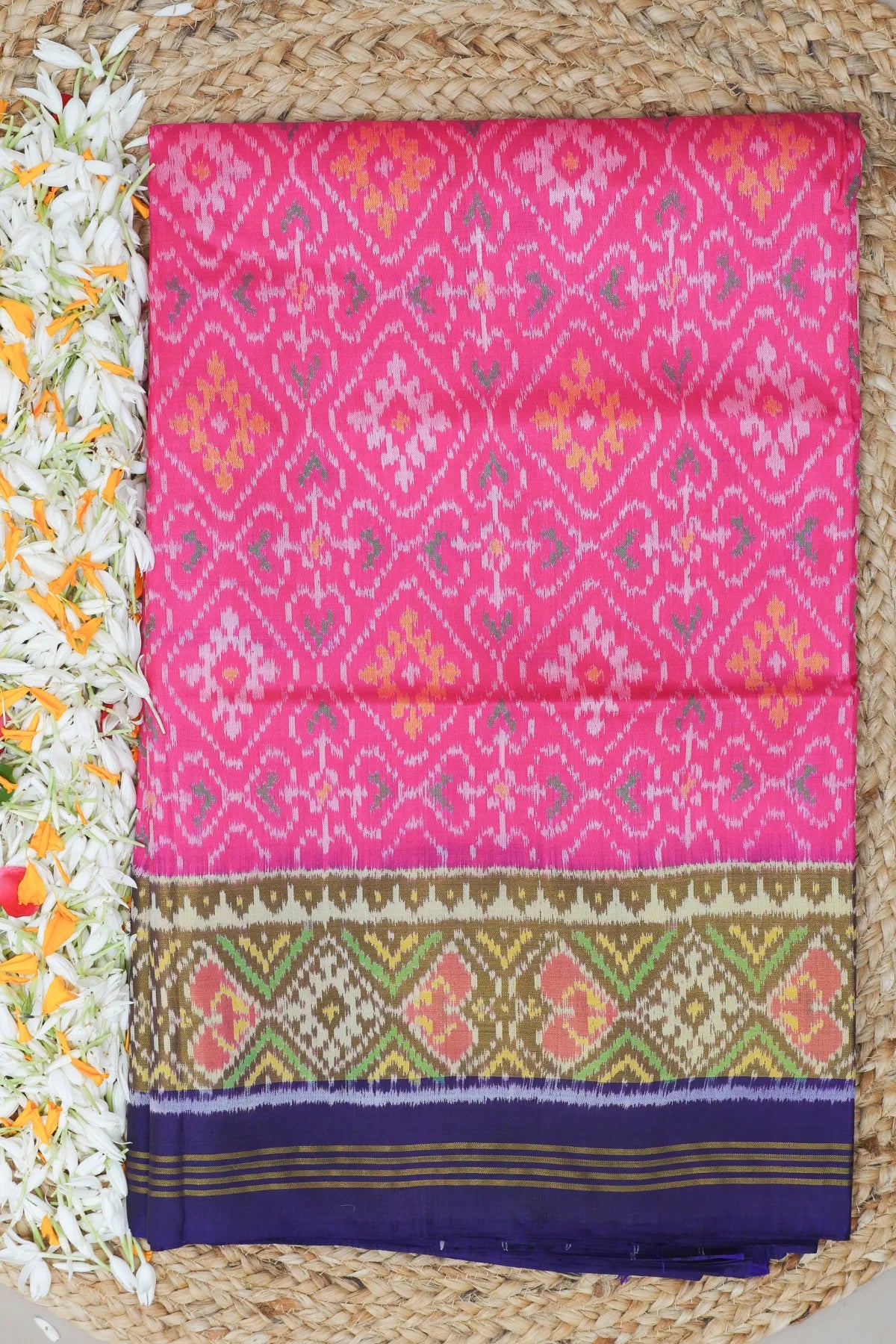 Paan chanda design with tissue border single ikat patola saree