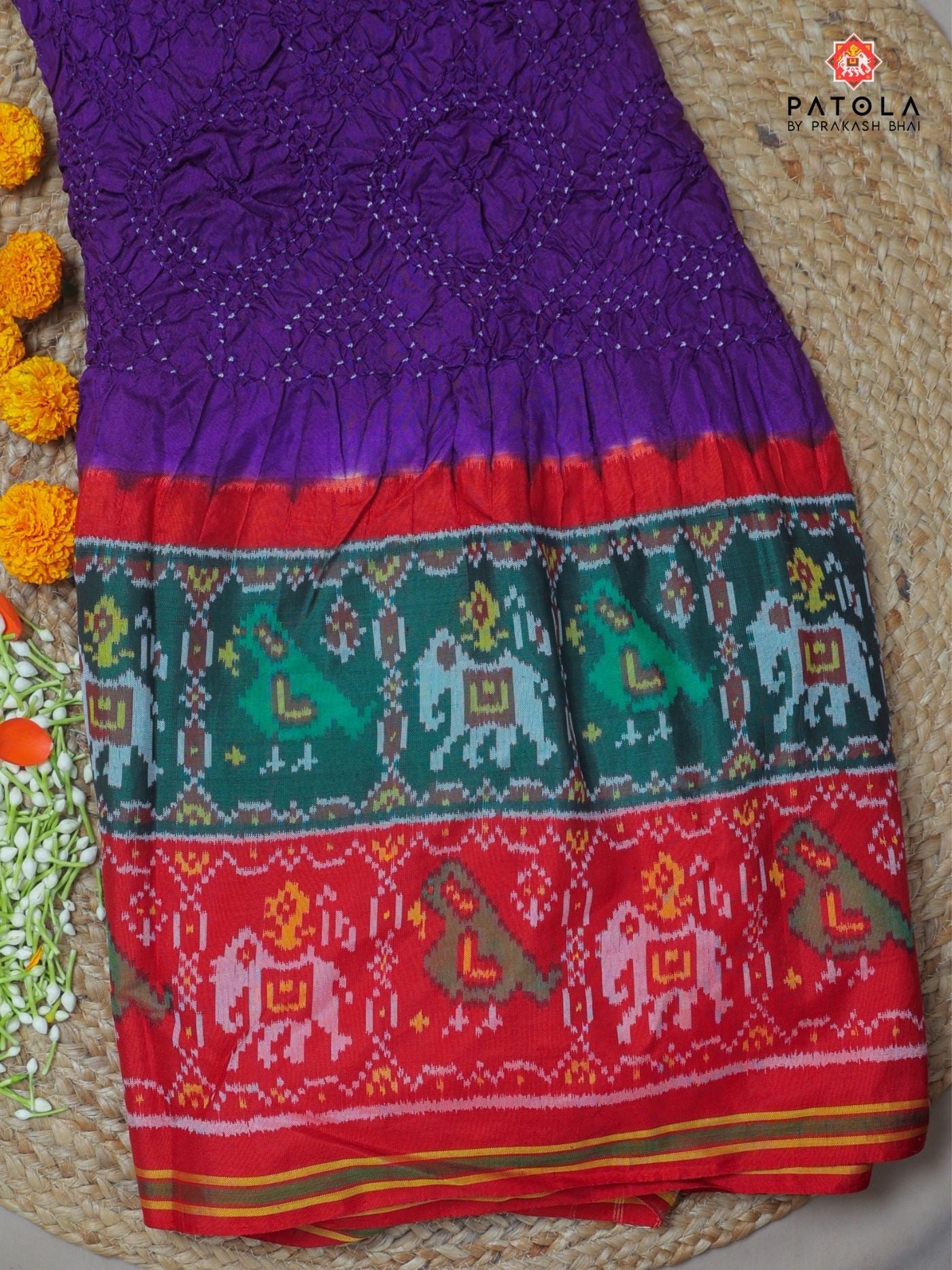 Two colors border with small bandhej patola saree