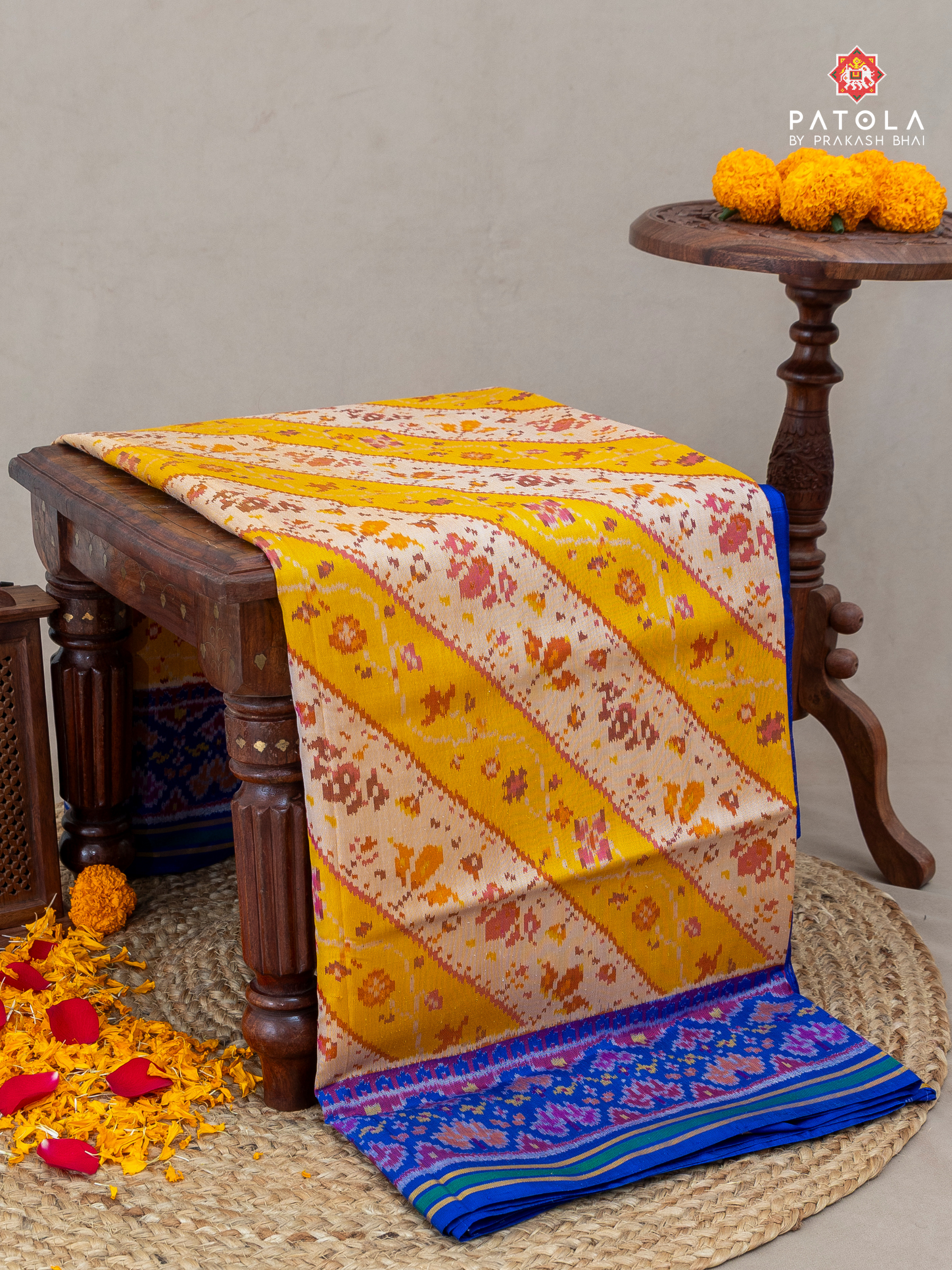Masterpiece cross flowers designer with traditional border design Semi double ikat patola saree
