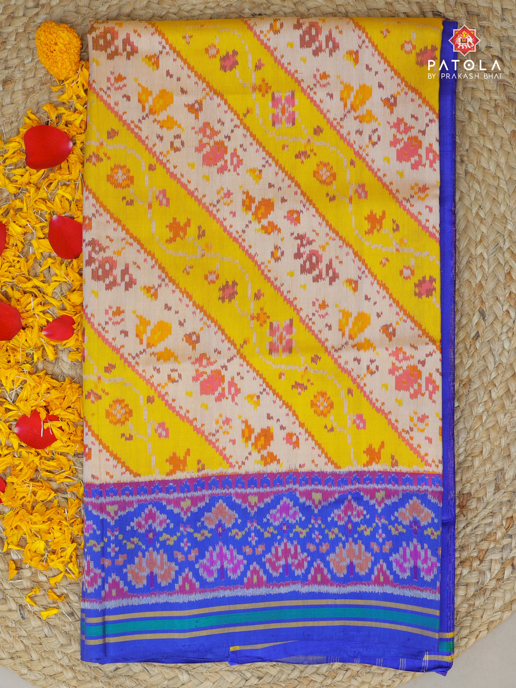 Masterpiece cross flowers designer with traditional border design Semi double ikat patola saree