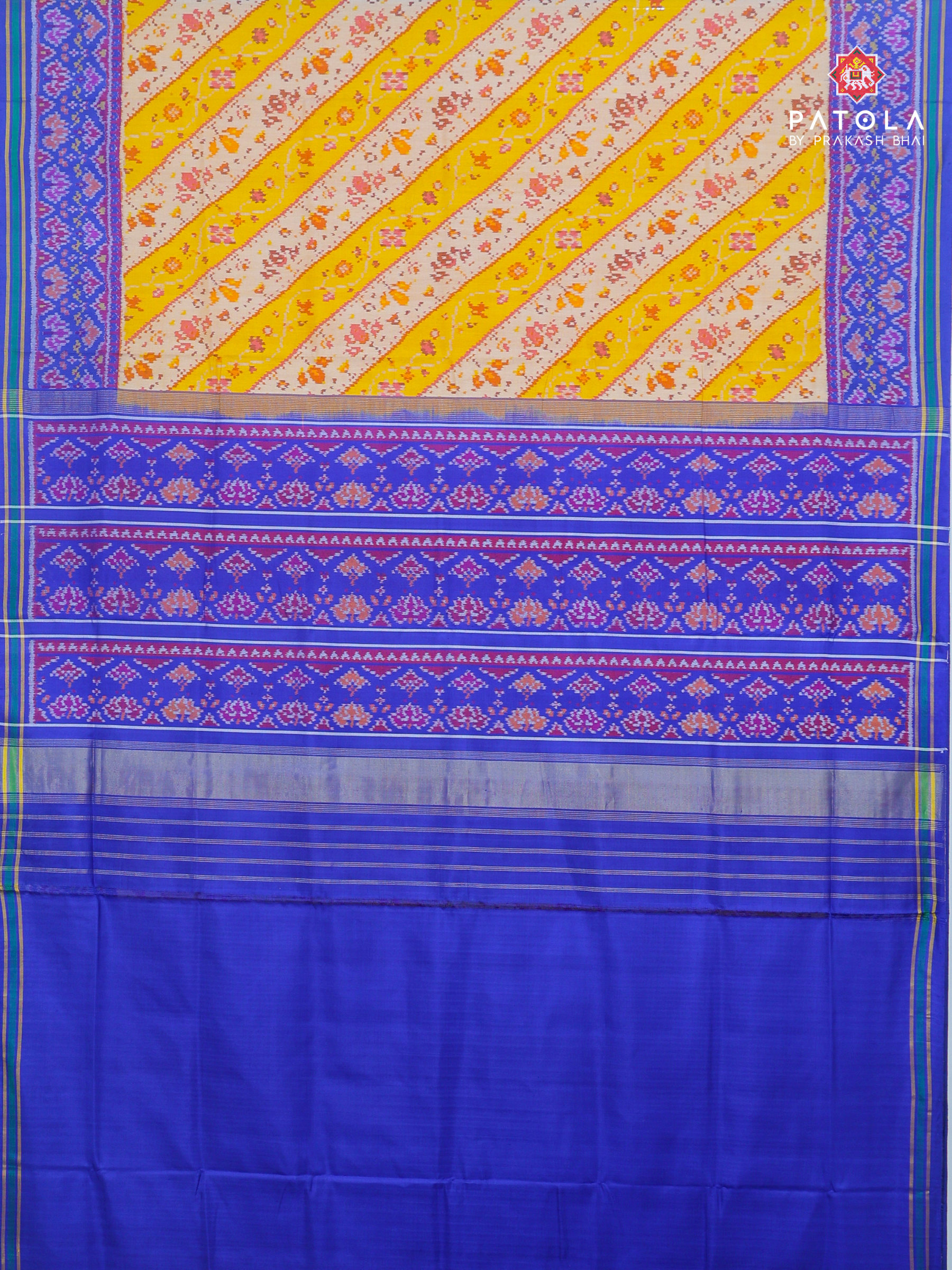 Masterpiece cross flowers designer with traditional border design Semi double ikat patola saree