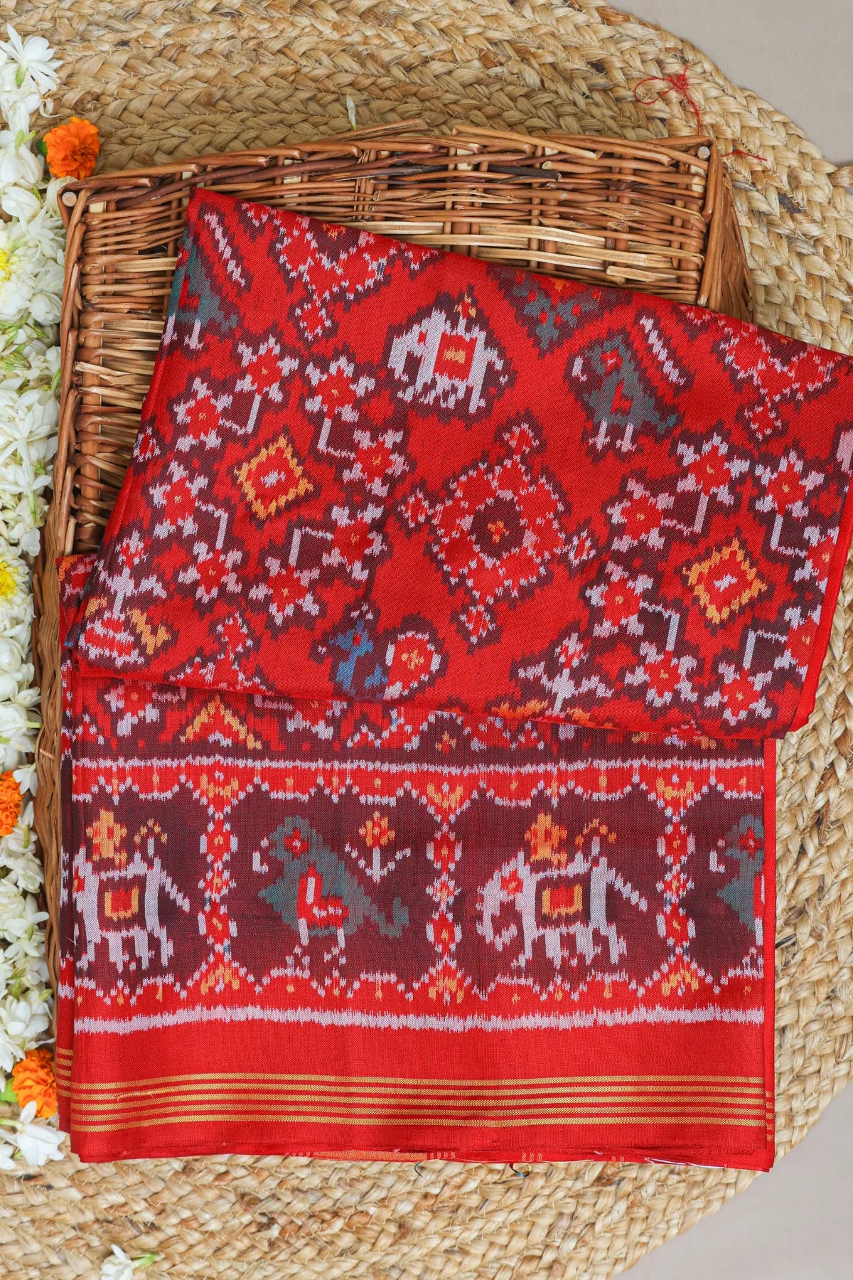 Traditional navratna with chanda design palllu border motifs design semi double ikat patola saree