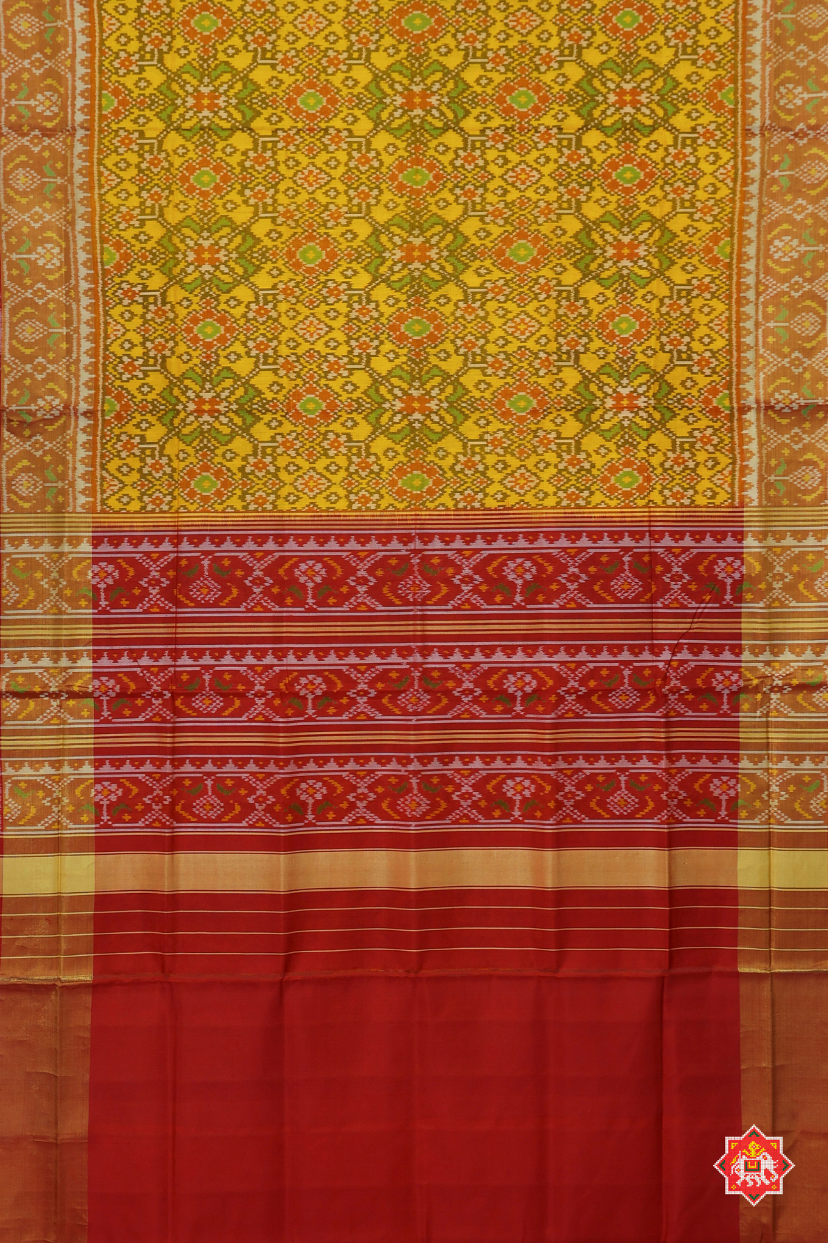 Traditional navratna design with minakari work tissue border single ikat patola